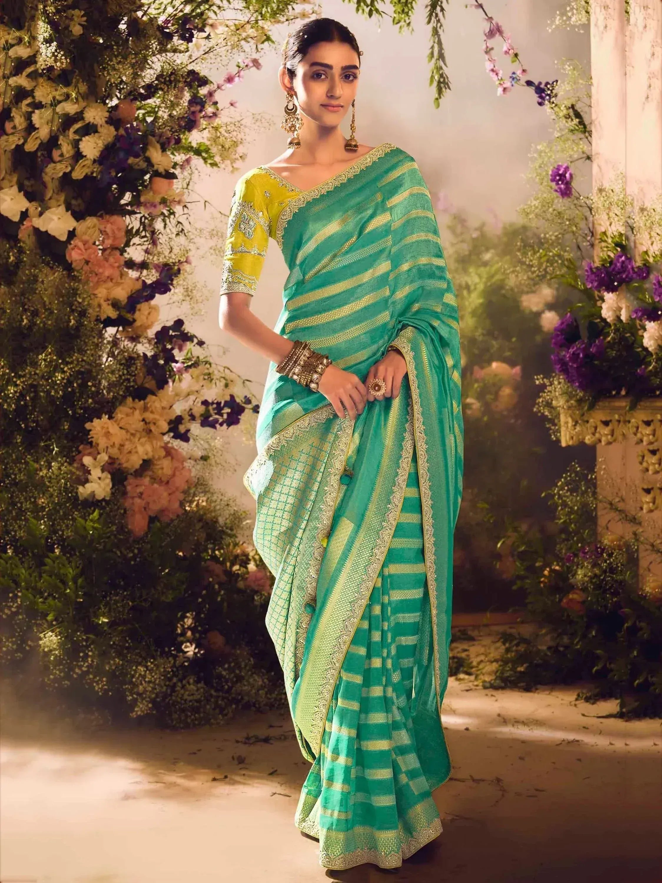 Teal and gold striped saree with yellow blouse, perfect for Indian ethnic wear occasions