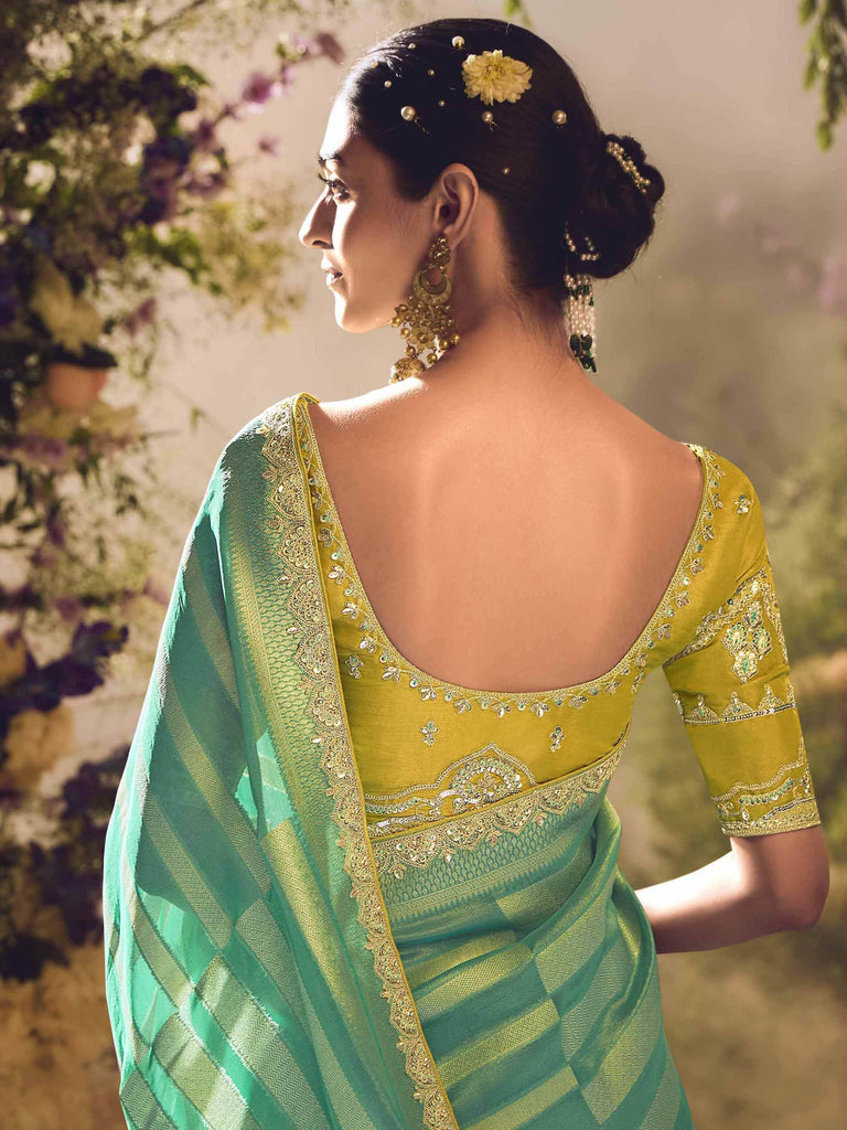 Captivating Sea Green Zari Weaving Organza Saree With Blouse