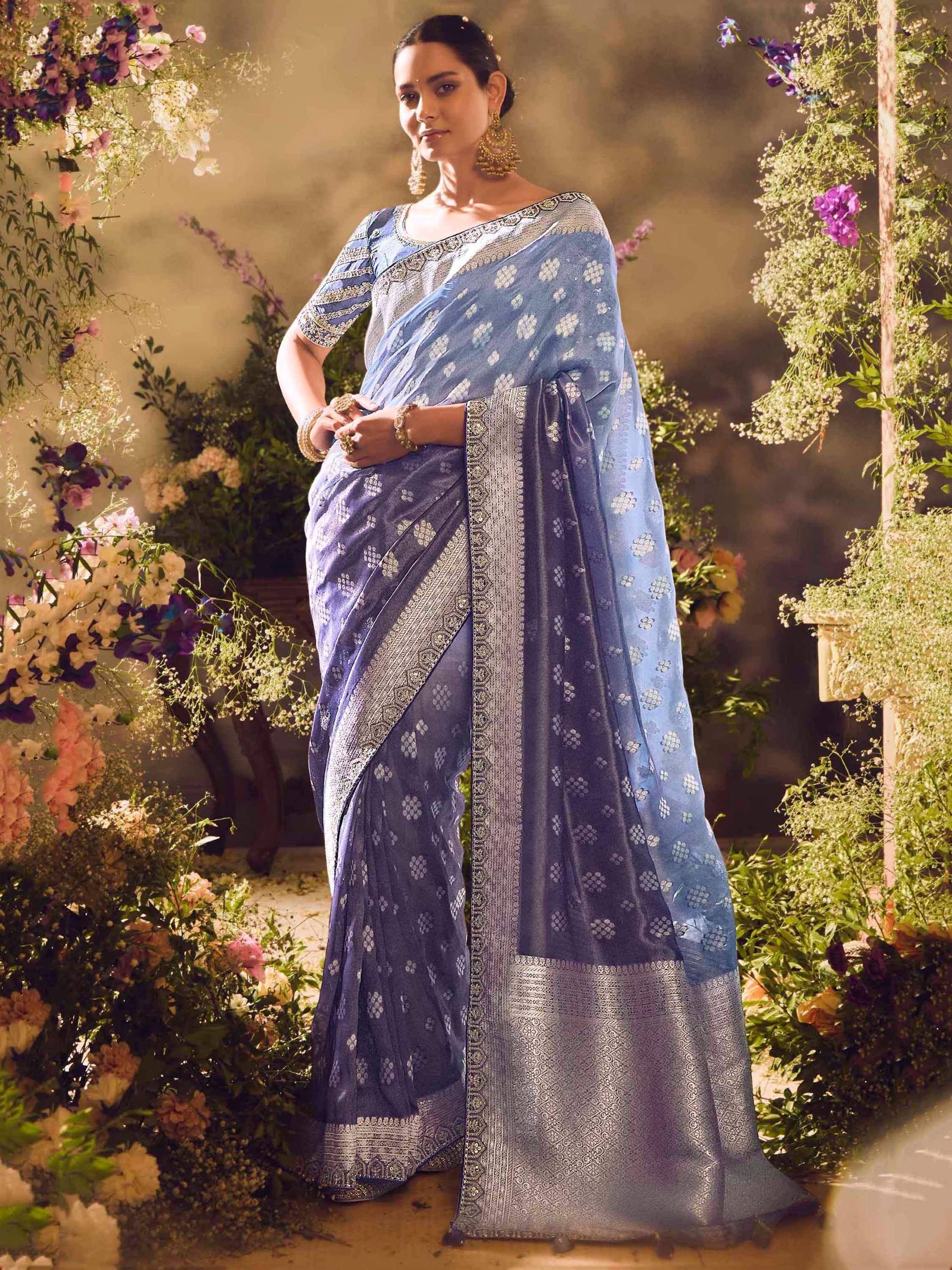 Elegant blue designer saree with silver embroidery, perfect for Indian ethnic occasions and weddings.