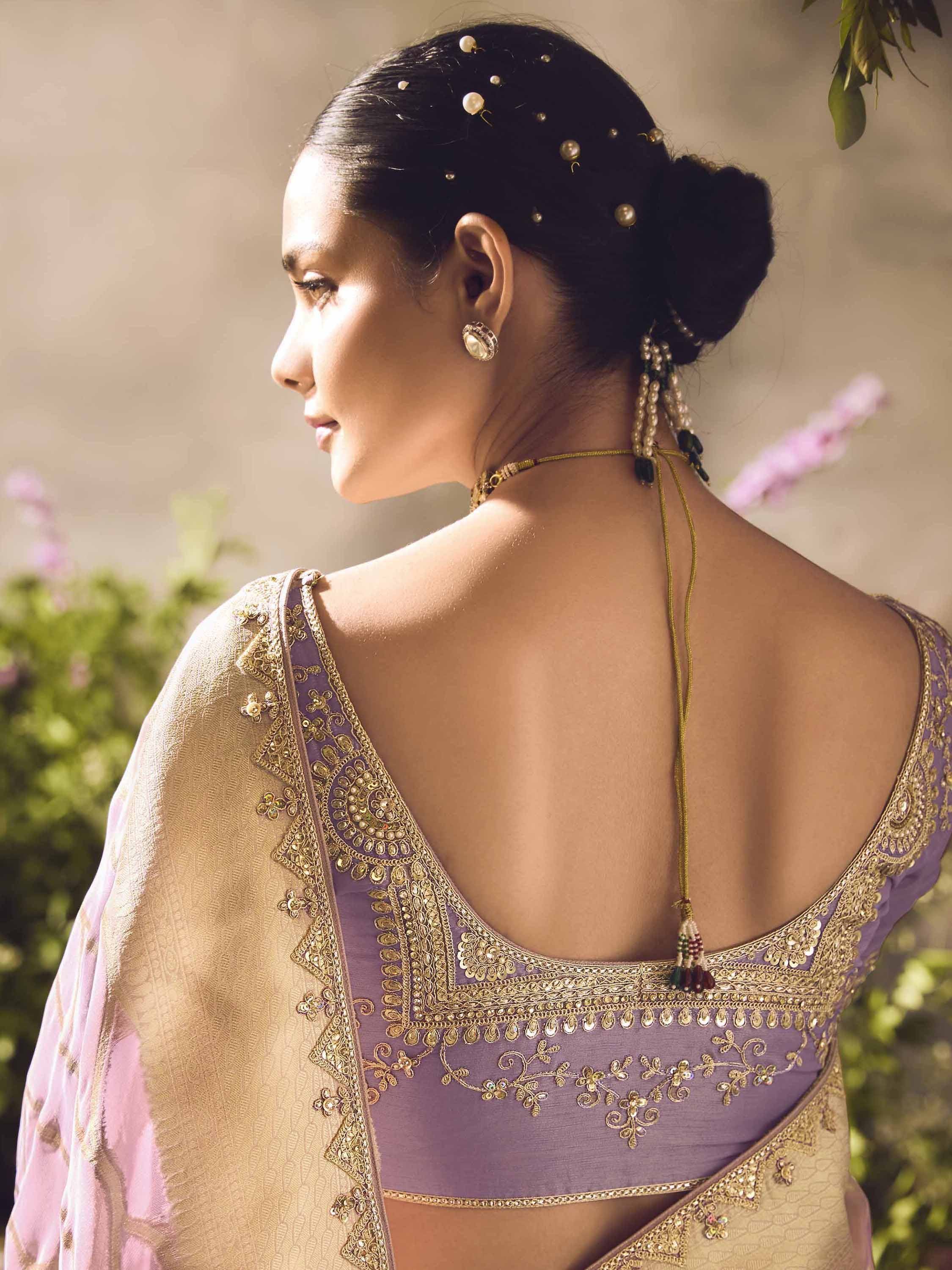 Purple and gold embroidered saree blouse with open back, traditional Indian ethnic wear