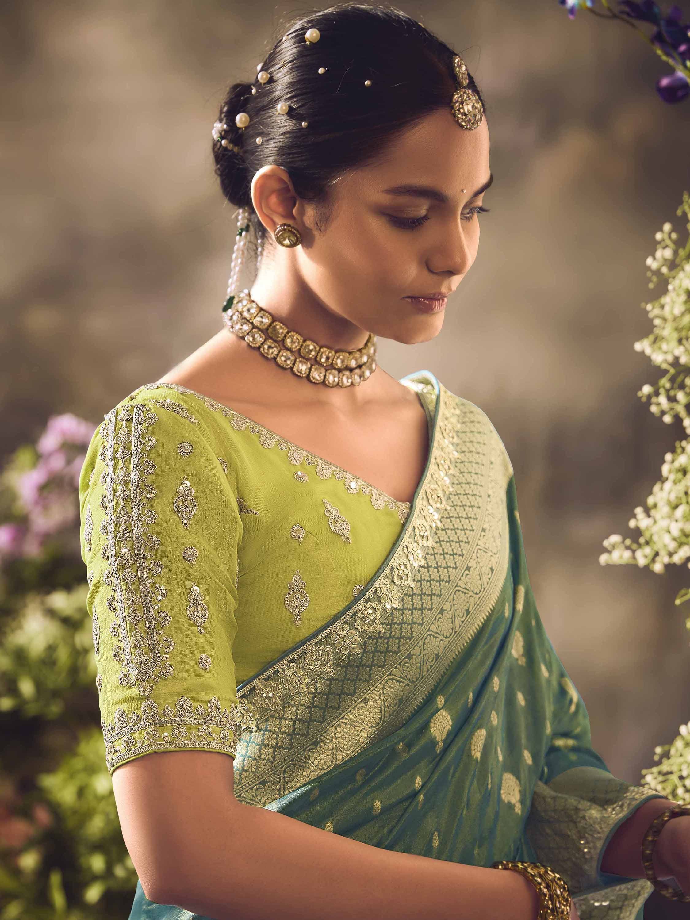 Elegant green saree with gold embroidery, perfect for Indian ethnic wear and festive occasions.