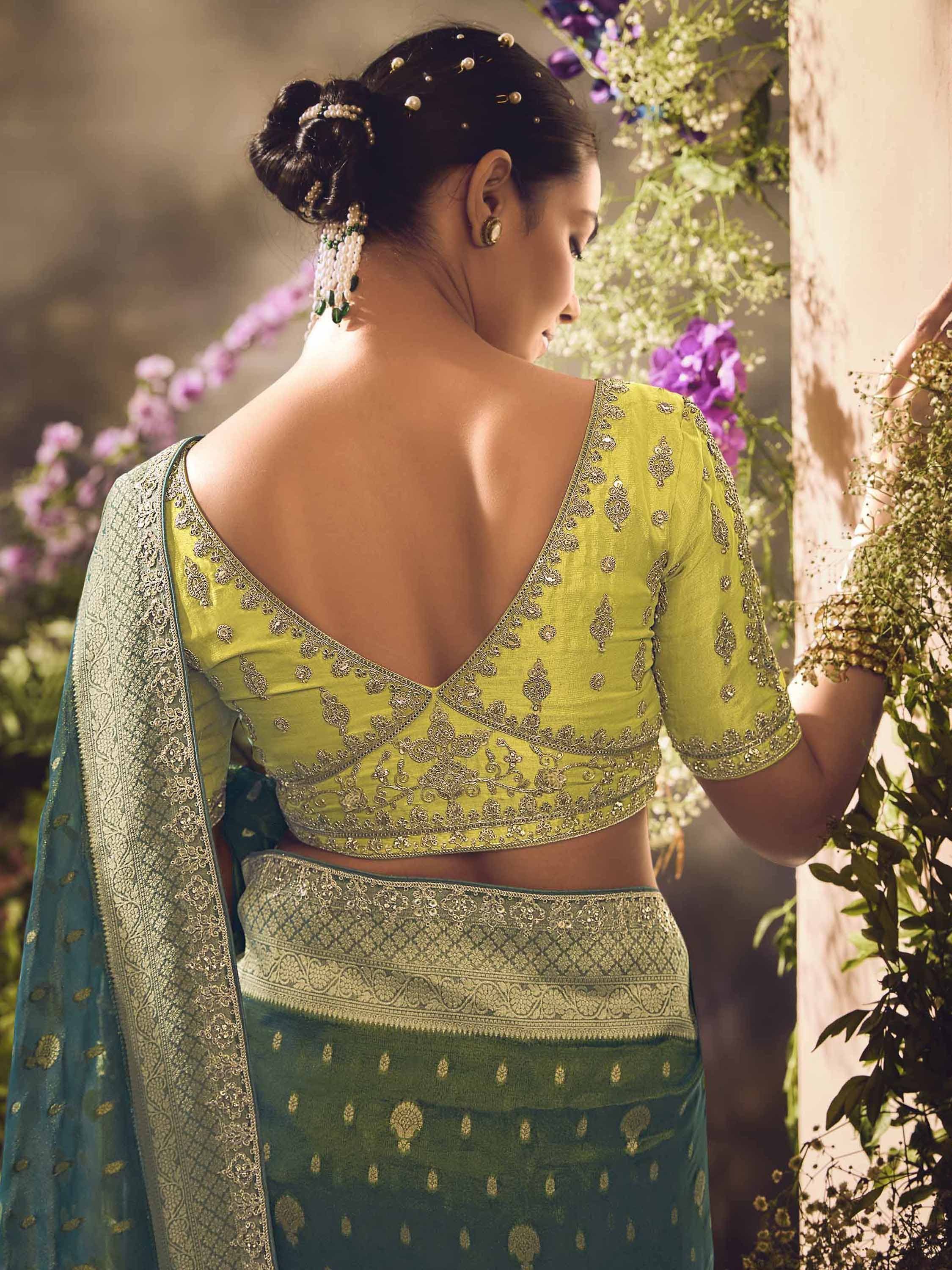 Green embroidered saree with backless blouse, perfect for Indian ethnic wear occasions