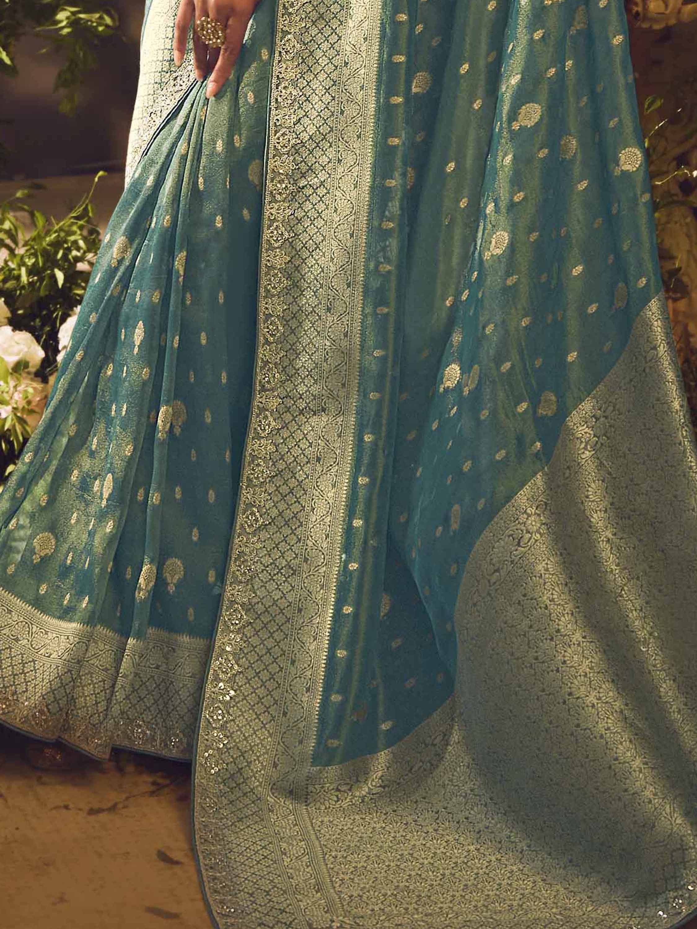 Teal lehenga choli with gold embroidery and intricate border, Indian ethnic wear