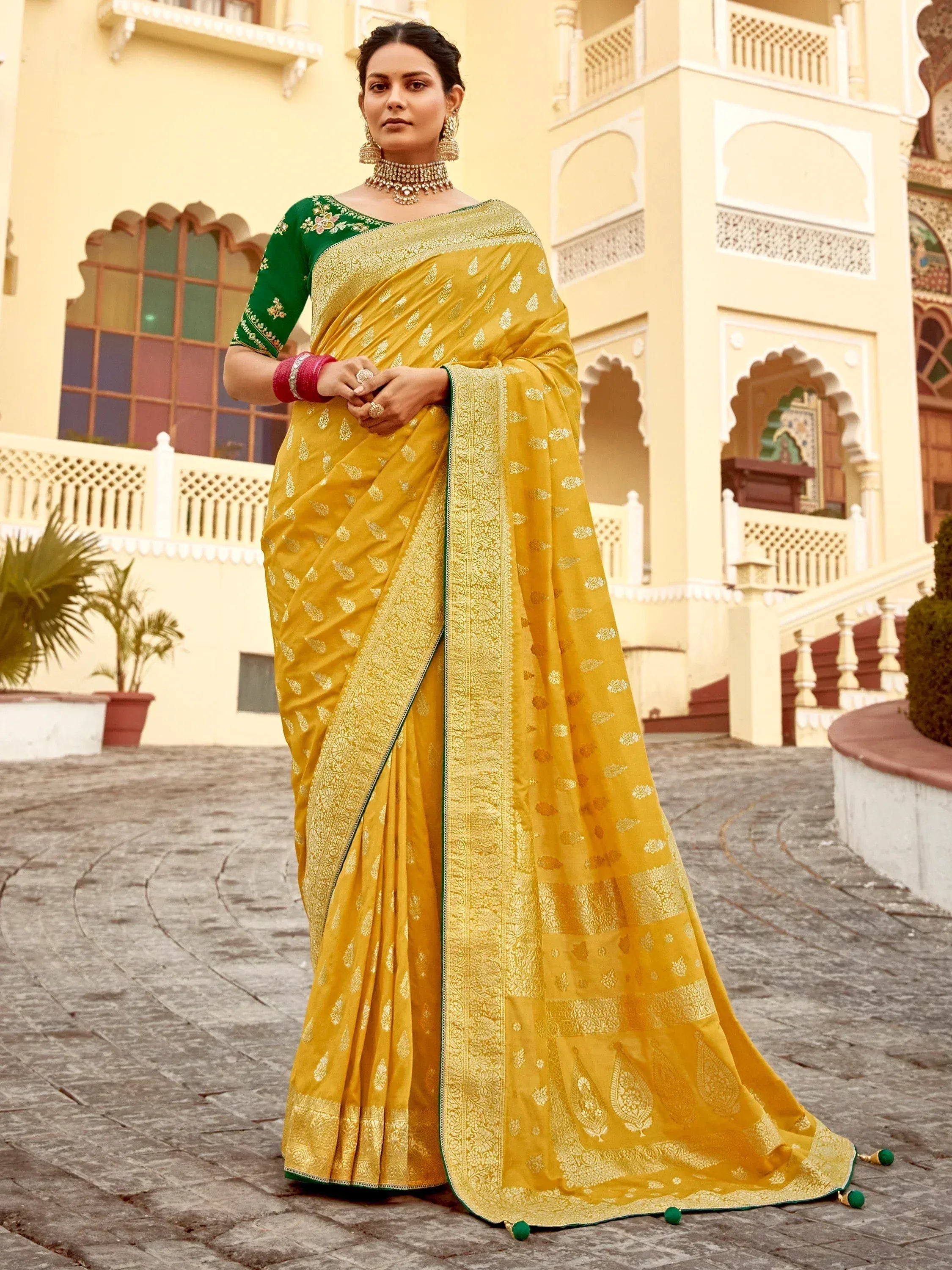 Yellow embroidered saree with green blouse, perfect for Indian ethnic wear occasions