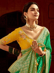 Outstanding Green Zari Weaving Dola Silk Saree With Blouse