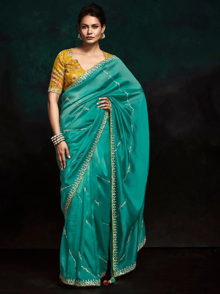 Beautiful Teal Green Embroidered Tissue Silk Festival Wear Saree