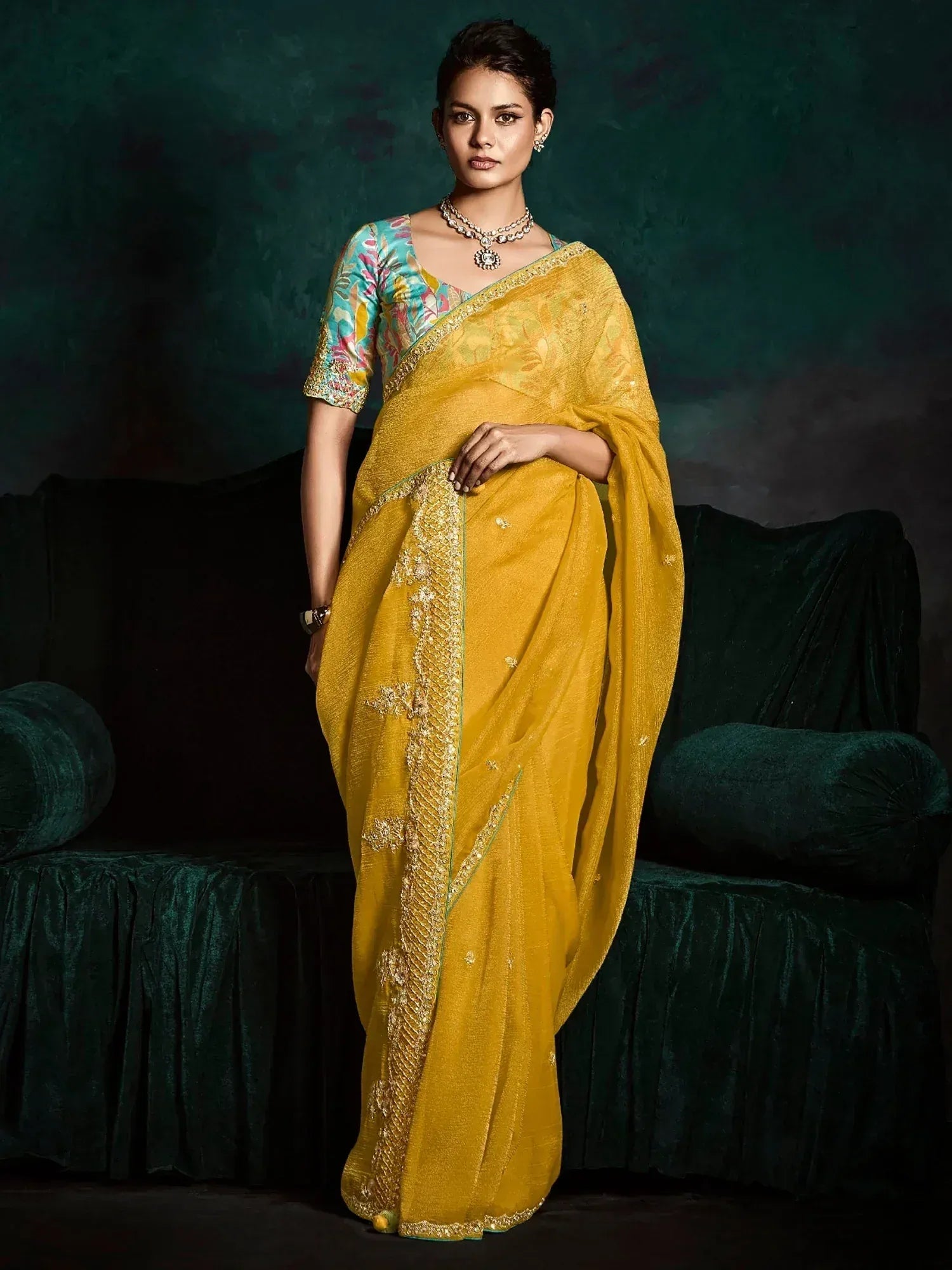 Yellow embroidered saree with floral blouse, perfect for Indian ethnic occasions