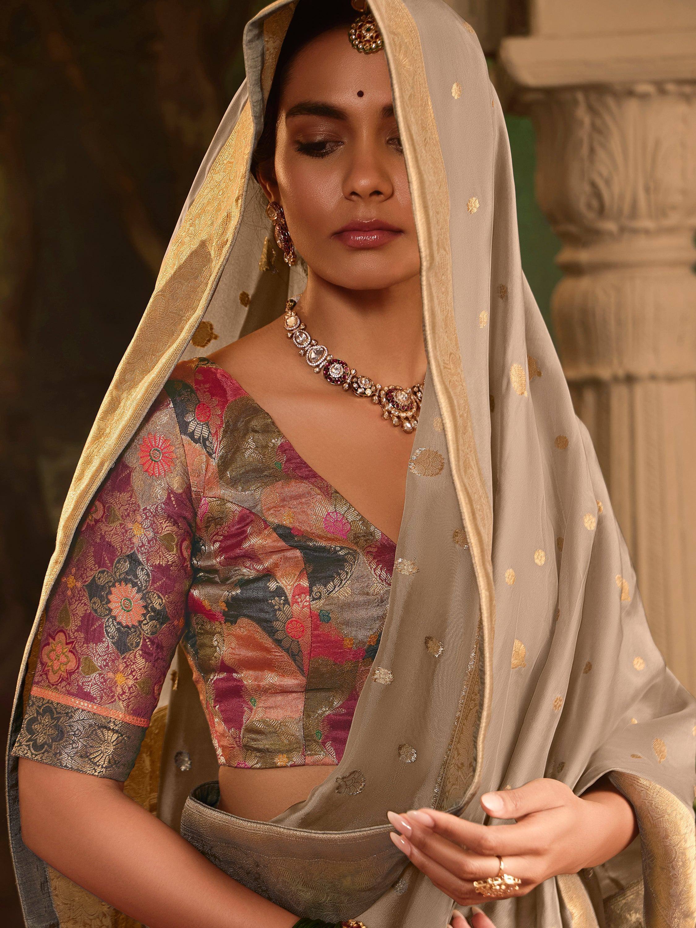 Woman in floral embroidered lehenga choli with gold polka dot dupatta, traditional Indian ethnic wear