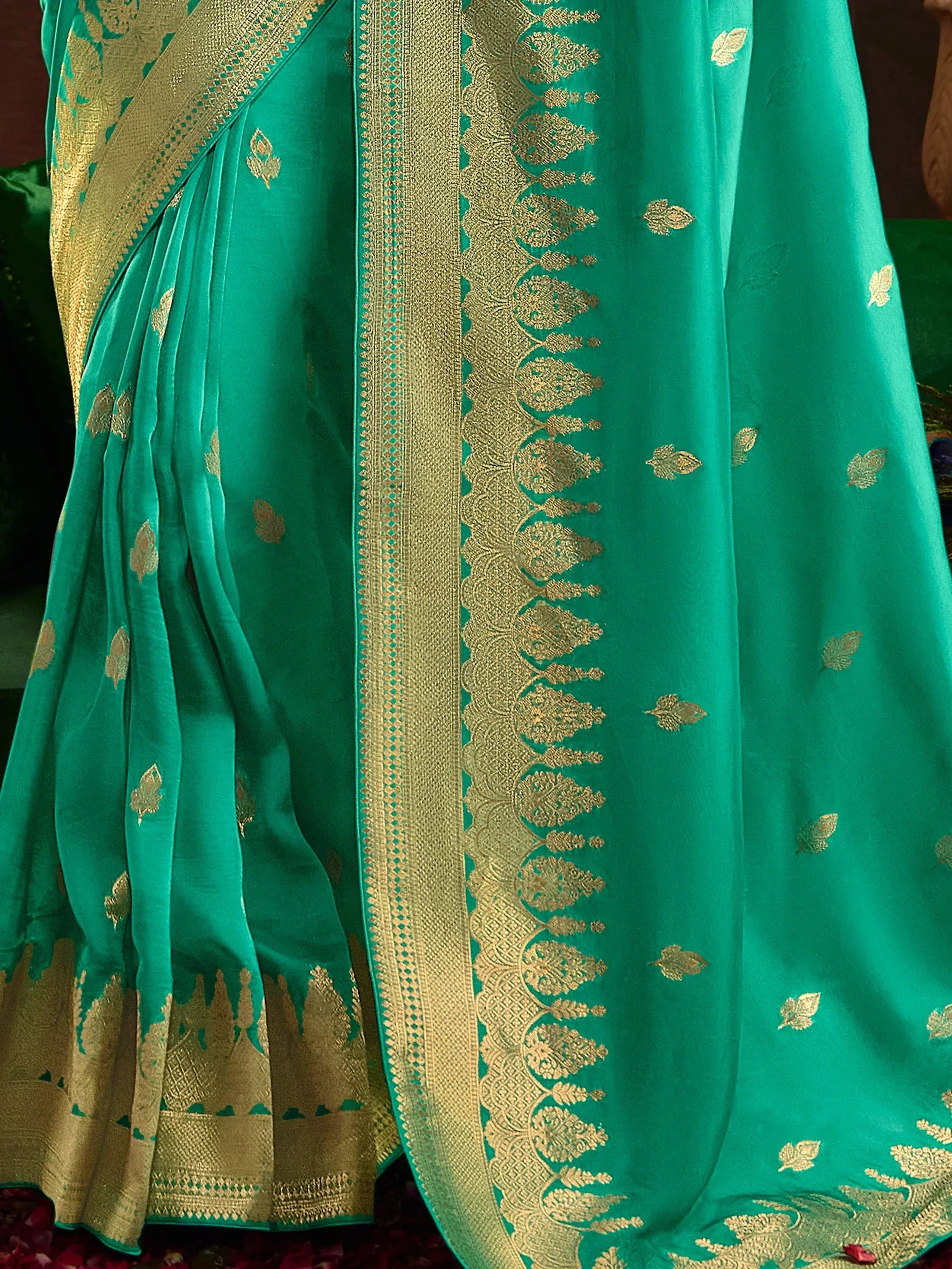 Emerald green saree with gold leaf motifs and intricate border, Indian ethnic wear