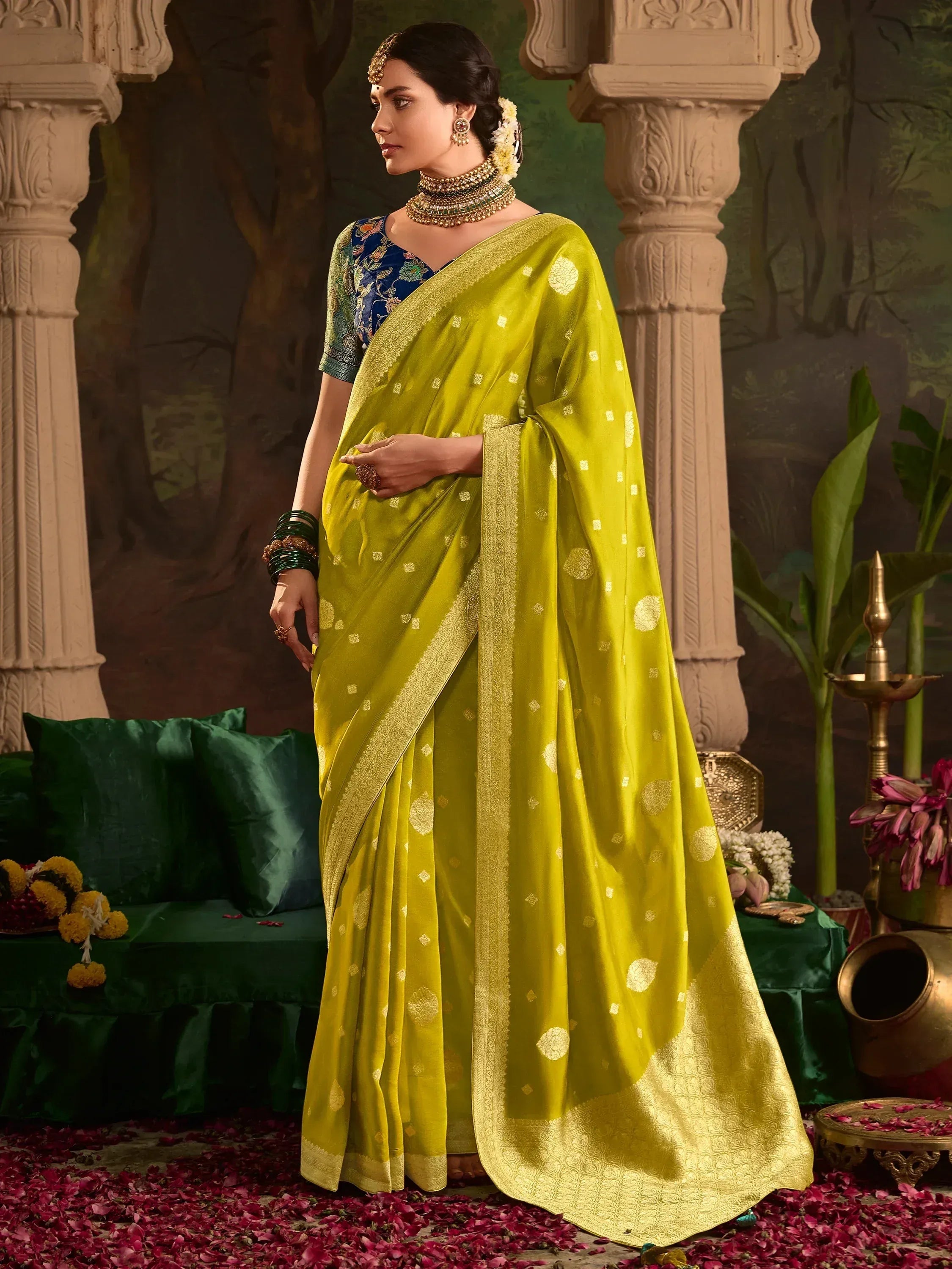 Yellow silk saree with gold motifs and blue embroidered blouse, traditional Indian ethnic wear