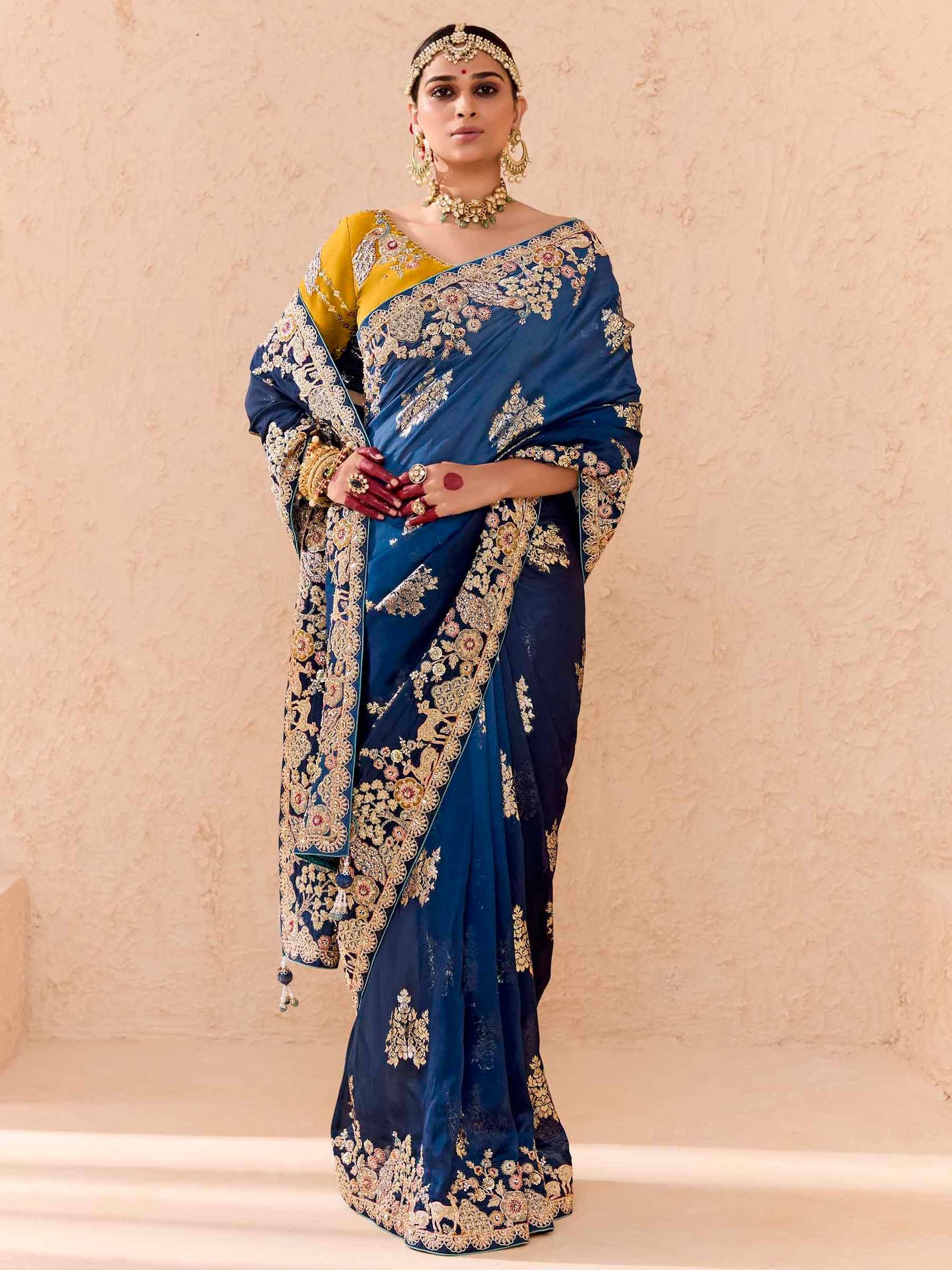Blue and gold embroidered saree with yellow blouse, traditional Indian ethnic wear for weddings
