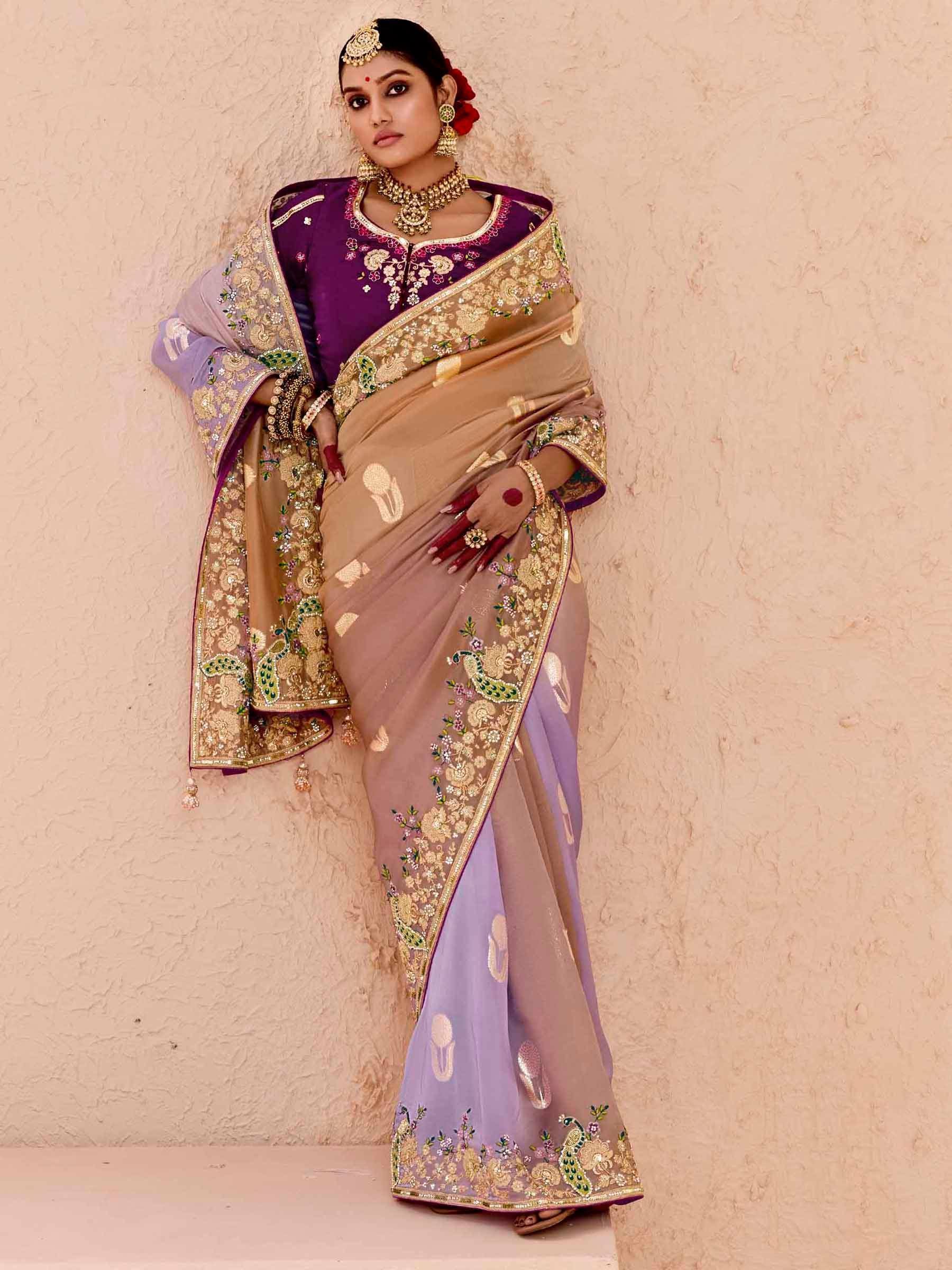 Elegant purple and beige embroidered saree with peacock motifs, perfect for Indian ethnic occasions