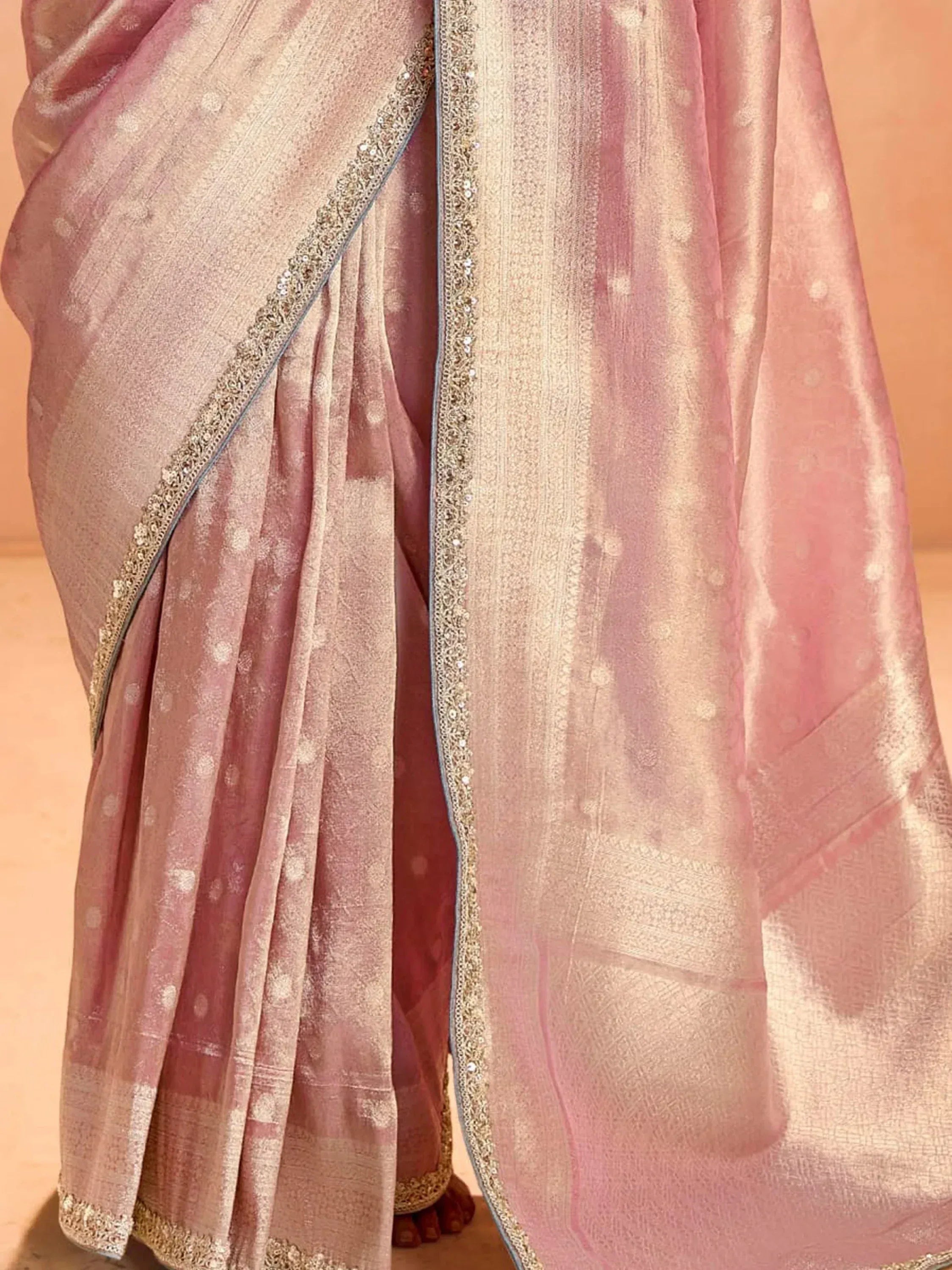 Pink silk saree with gold embroidery and sequin border, elegant Indian ethnic wear