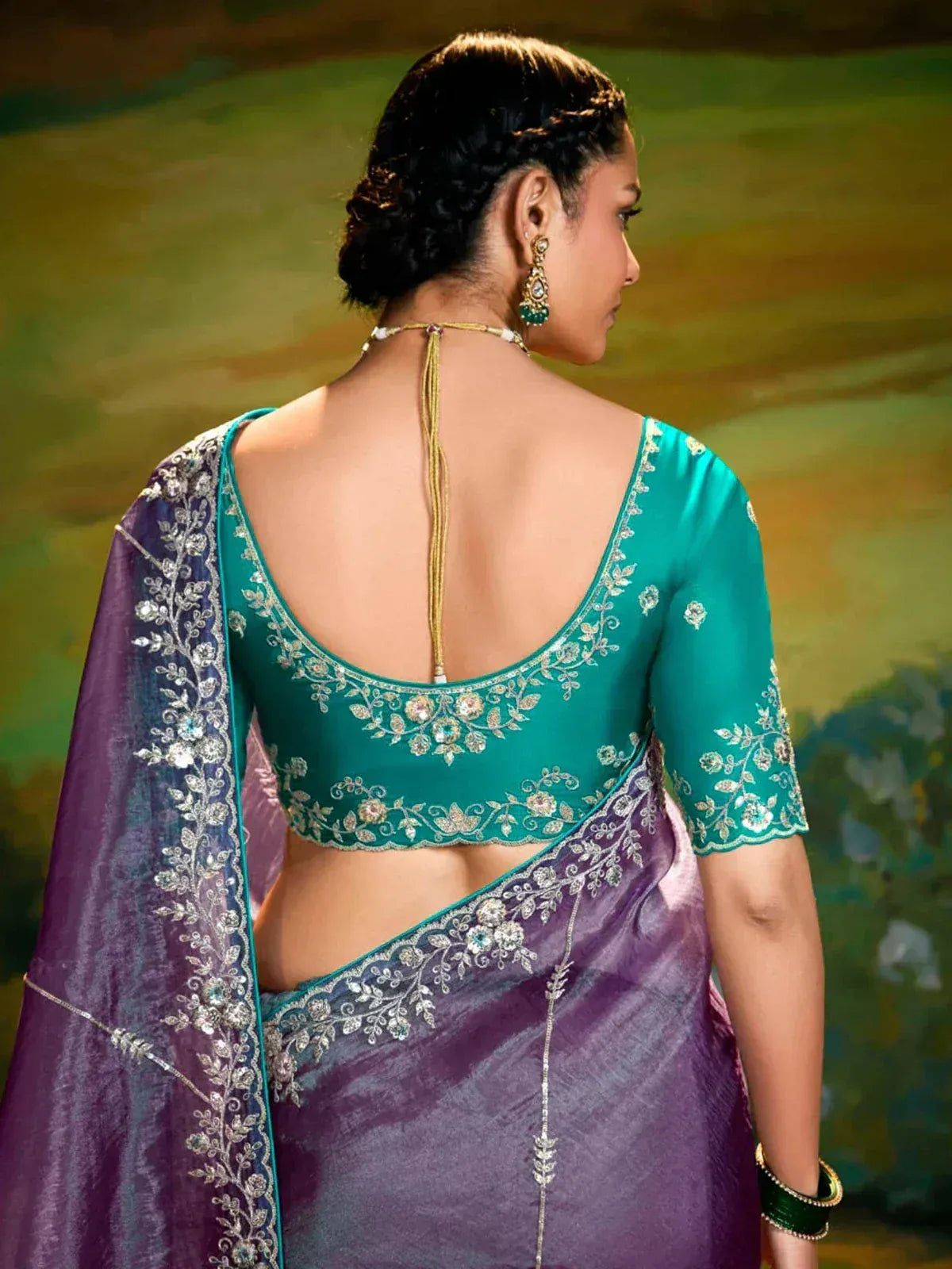 Teal embroidered blouse with purple saree, floral zari work, backless design, ethnic Indian wear