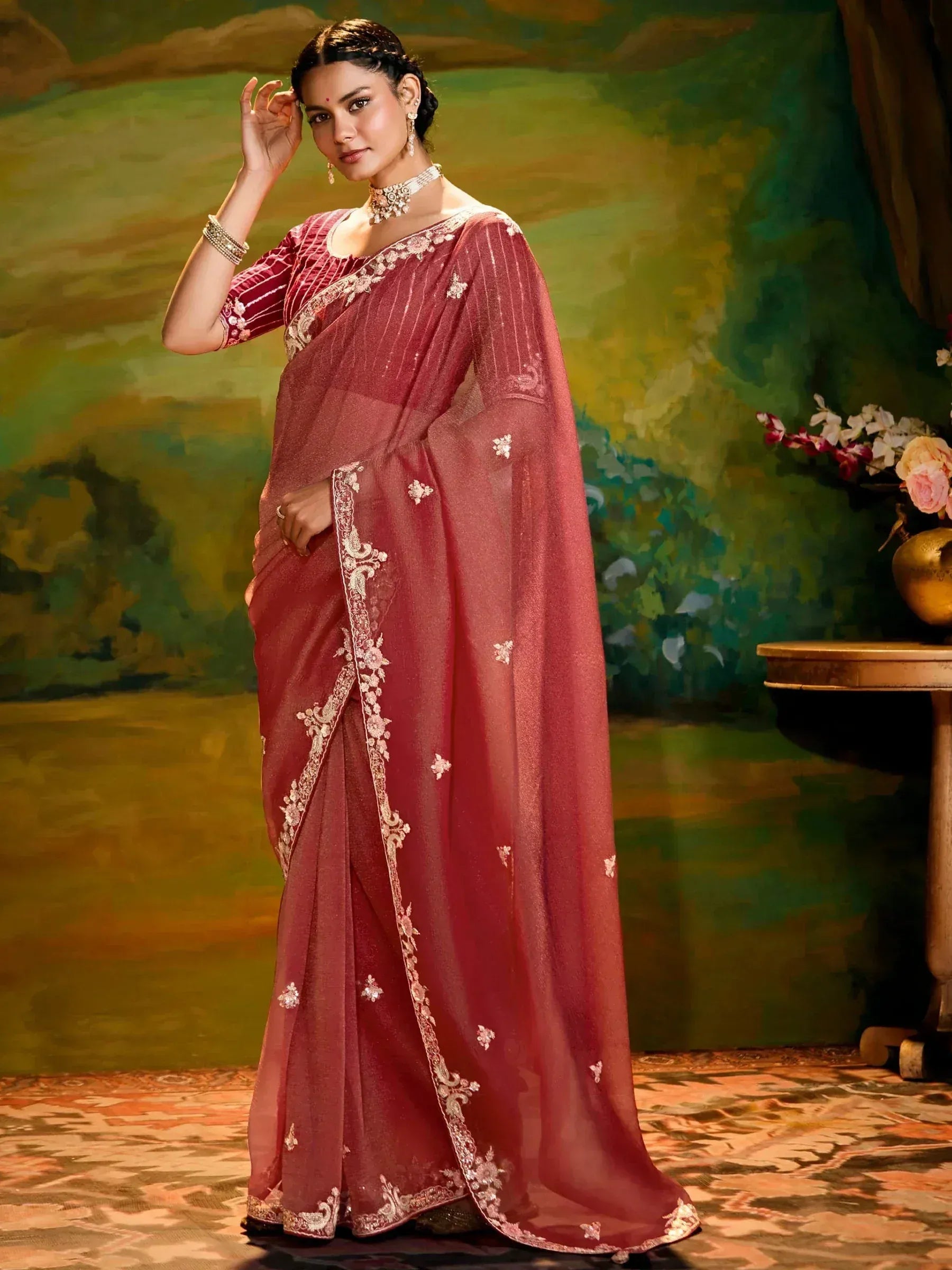 Elegant maroon saree with gold embroidery, perfect for Indian ethnic wear occasions