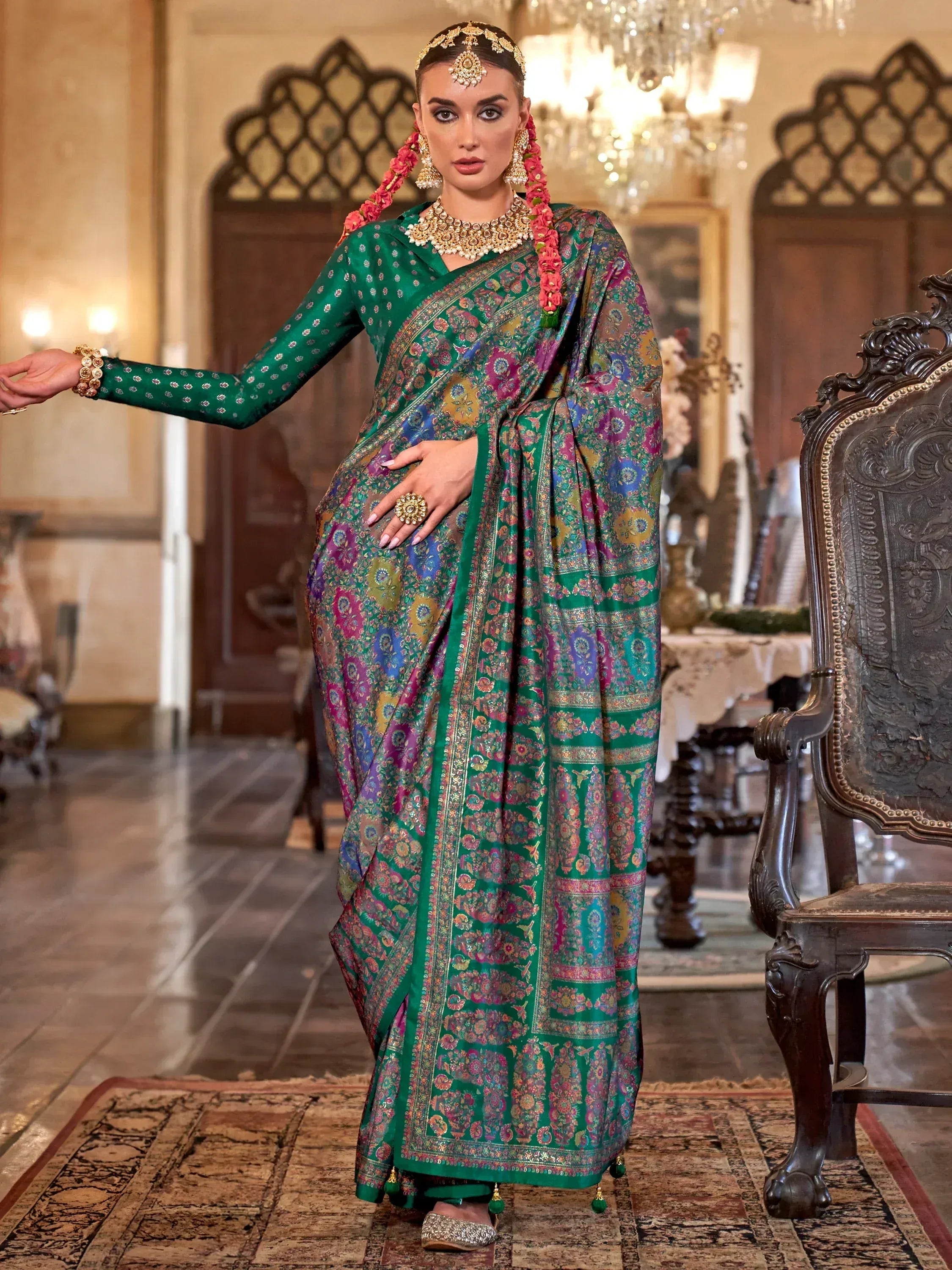Elegant green saree with floral patterns, perfect for Indian ethnic wear occasions.