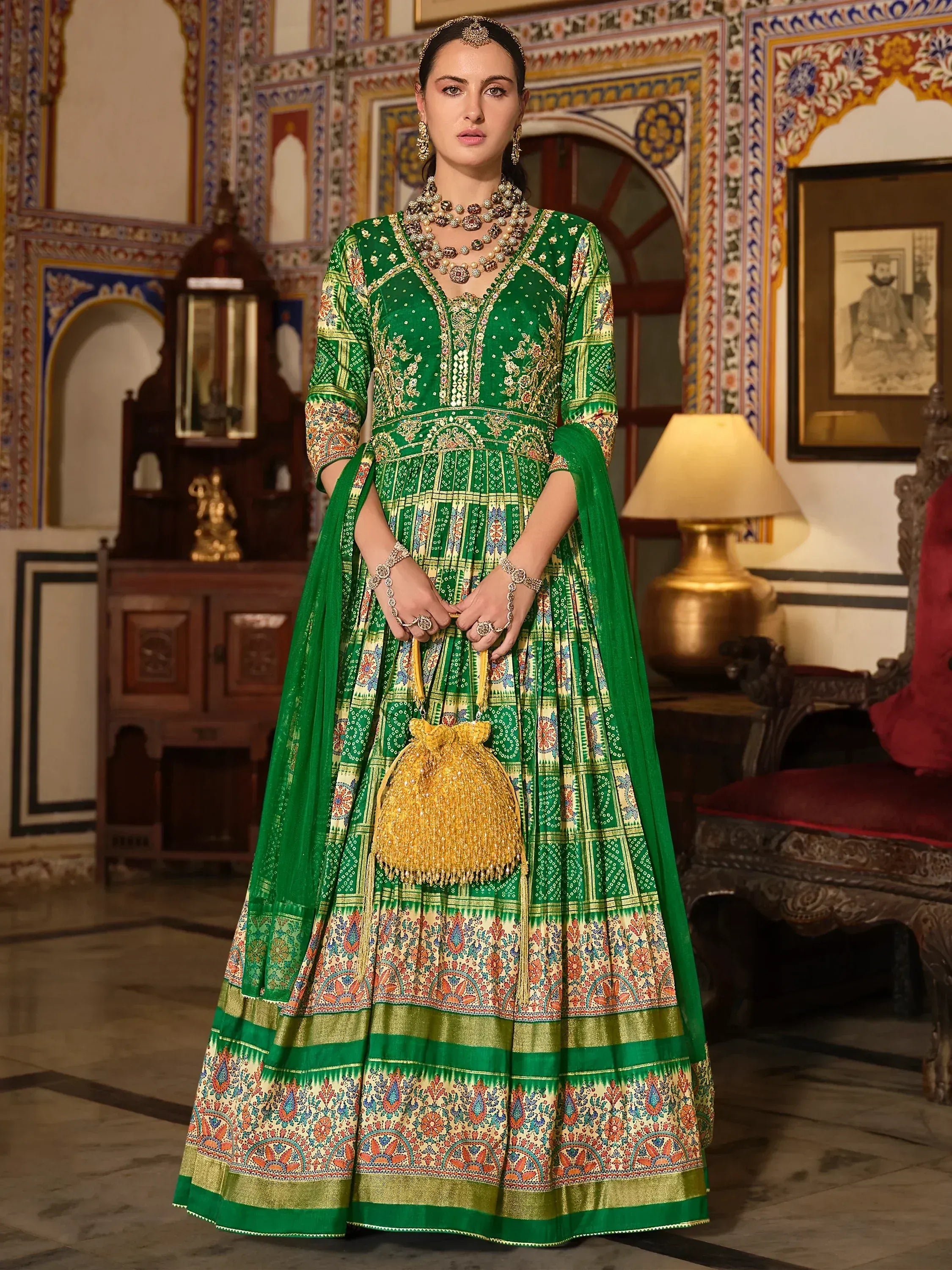 Green embroidered Indian lehenga choli with dupatta, traditional ethnic wear for women