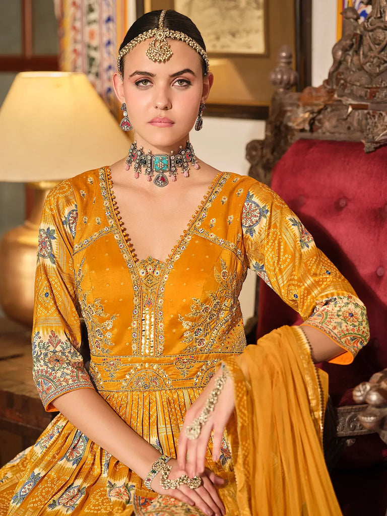 Charming Yellow Bandhani Printed Silk Haldi Wear Gown With Dupatta