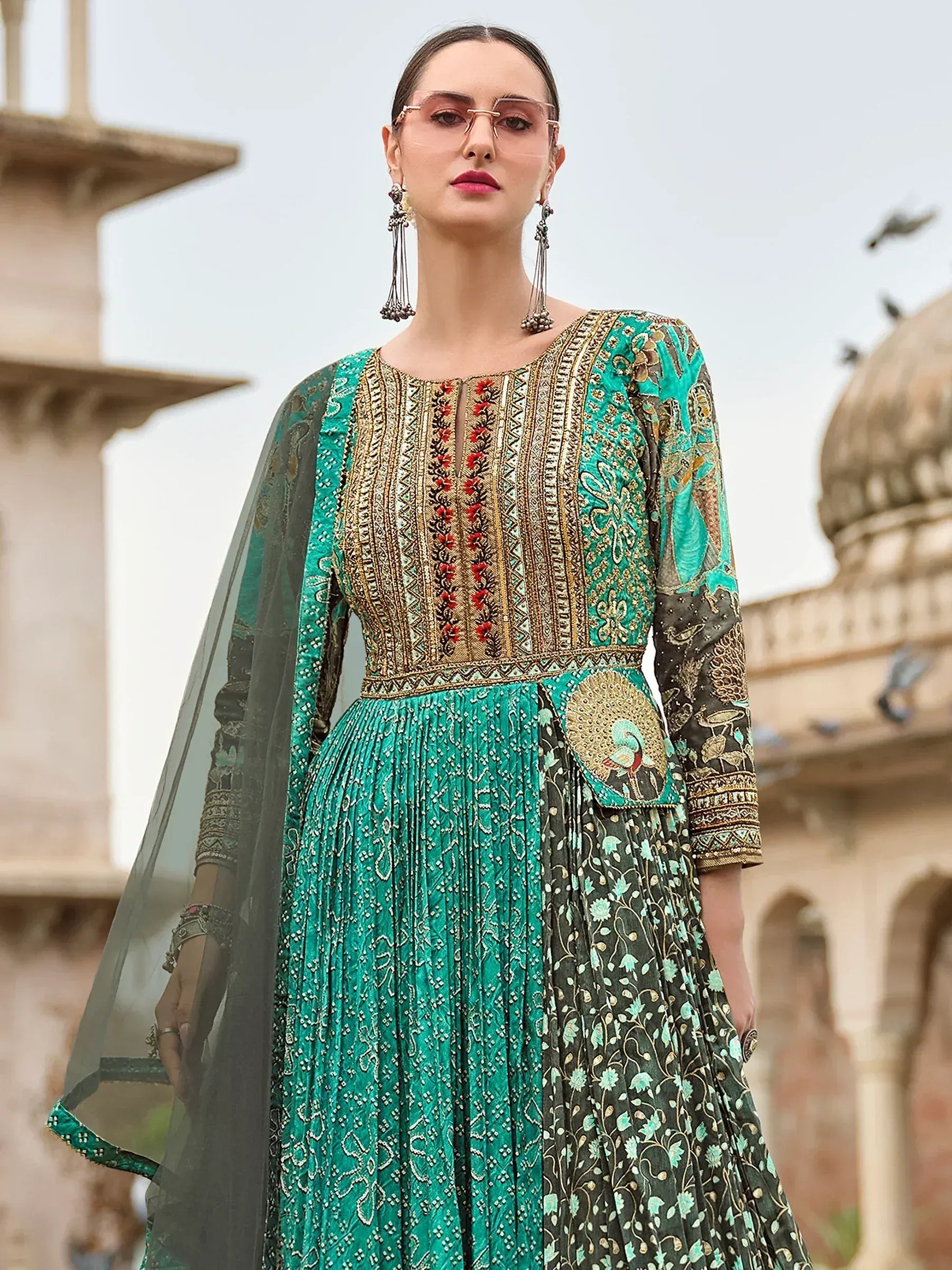 Emerald green embroidered anarkali suit with peacock motif, perfect for Indian ethnic wear occasions