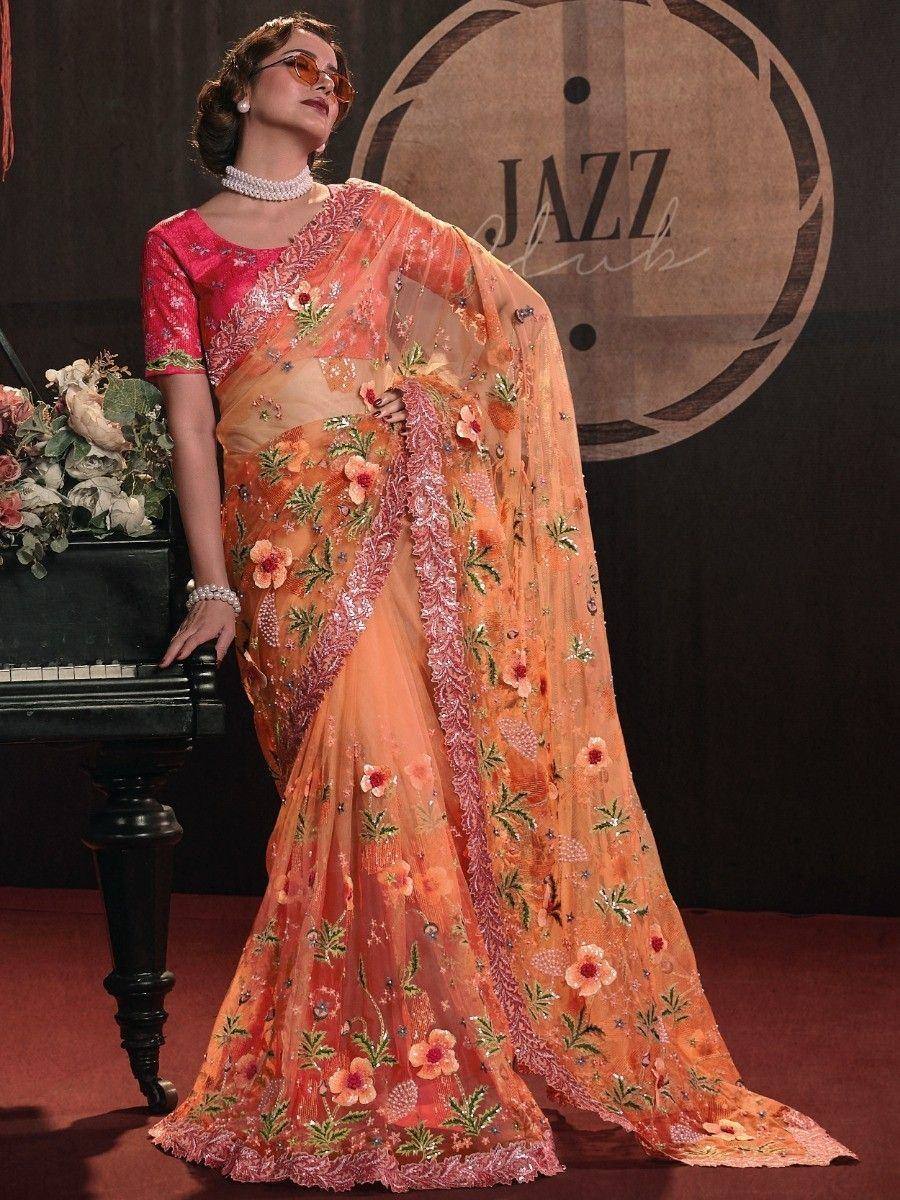 Orange floral embroidered saree with pink blouse, perfect for Indian ethnic occasions