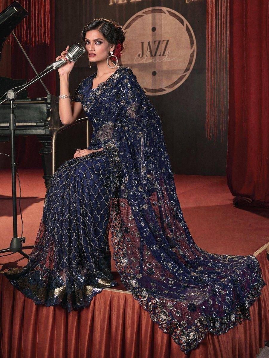 Elegant navy blue embroidered ethnic gown with sheer dupatta, perfect for evening events and parties.