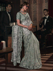 Charming Pista Green Sequins Net Party Wear Saree With Blouse