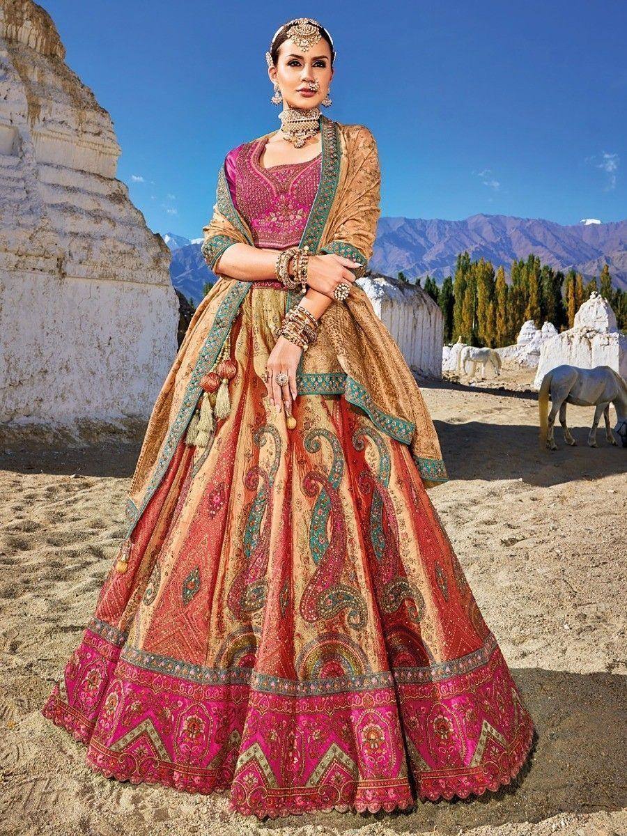 Woman in designer lehenga choli with intricate paisley prints, perfect for Indian ethnic wear events