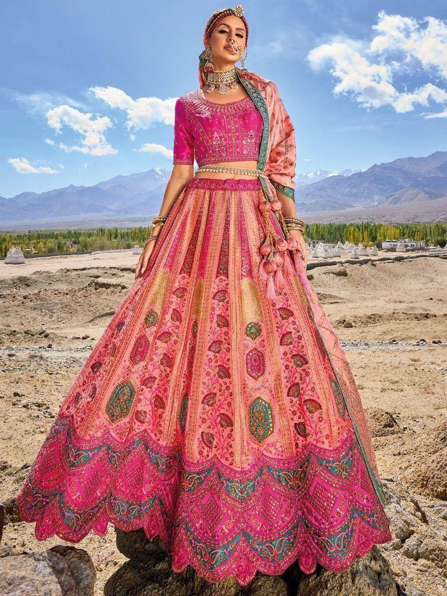 Pink embroidered lehenga choli with dupatta, perfect for Indian weddings and festive occasions