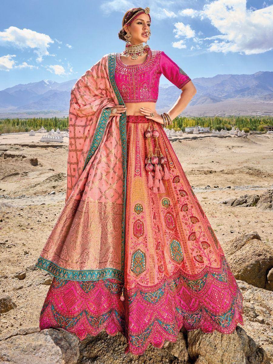 Pink embroidered lehenga choli with dupatta, perfect for Indian weddings and festive occasions