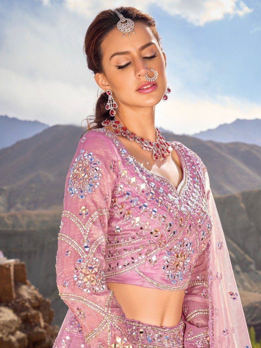 Pink embroidered lehenga choli with mirror work, traditional Indian ethnic wear for weddings and festivals