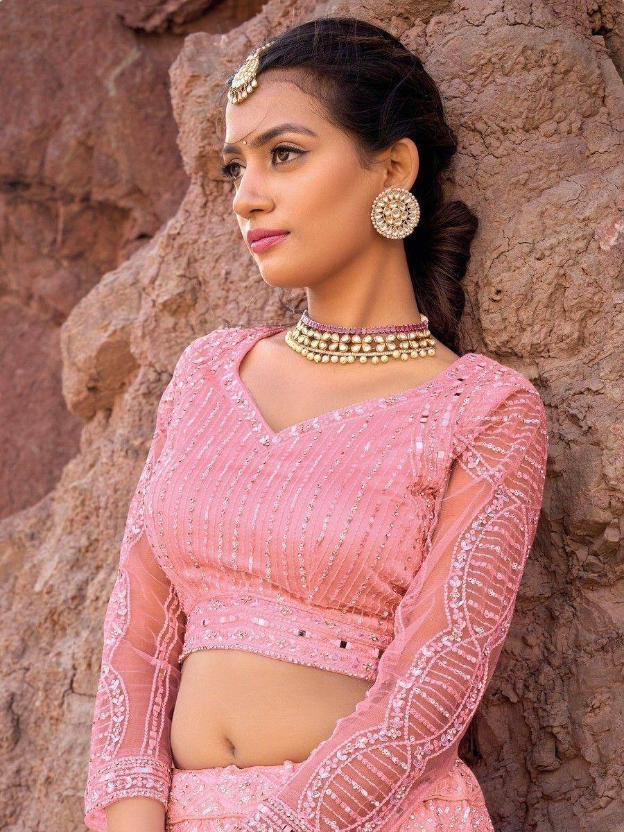 Pink sequined lehenga choli with sheer sleeves, traditional Indian ethnic wear for weddings and festivals