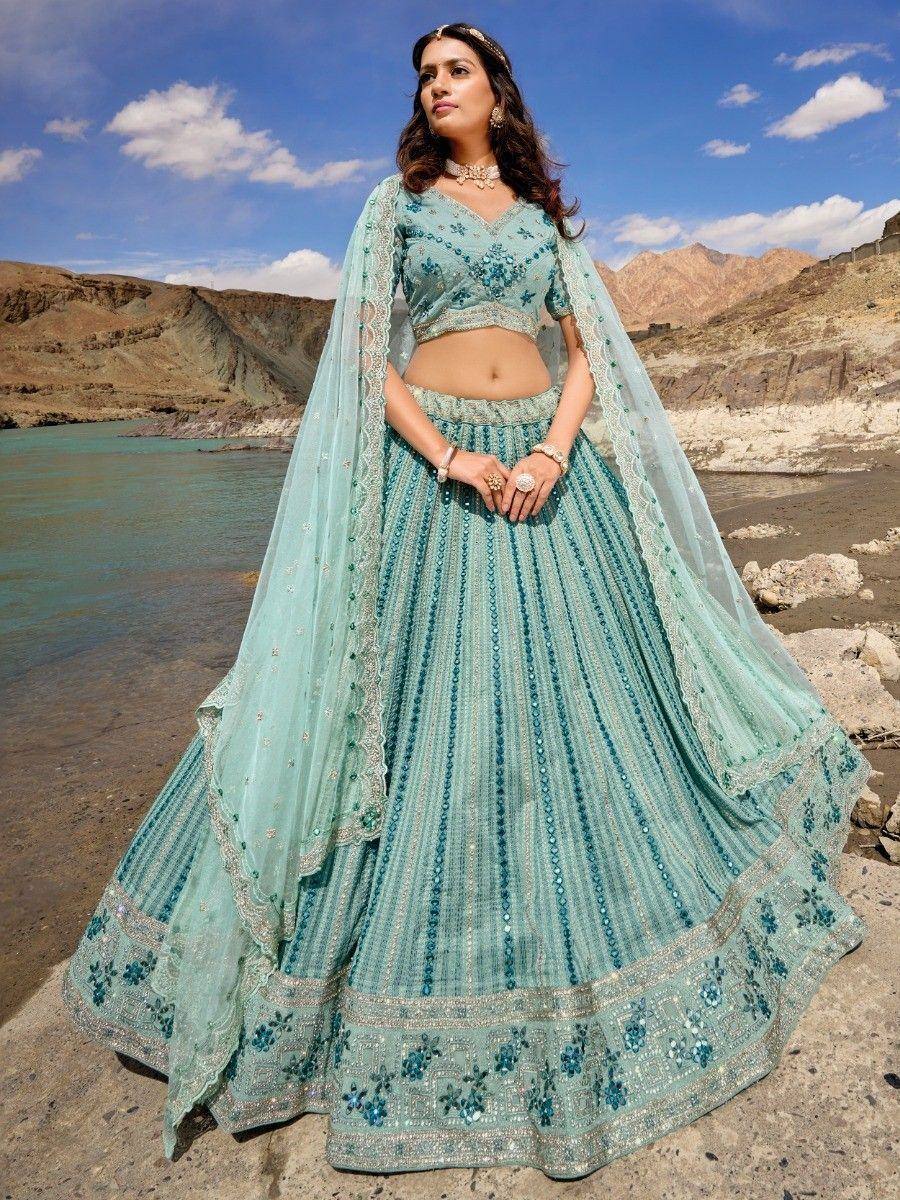 Mint green designer lehenga choli with sequin embroidery, perfect for weddings and festive occasions