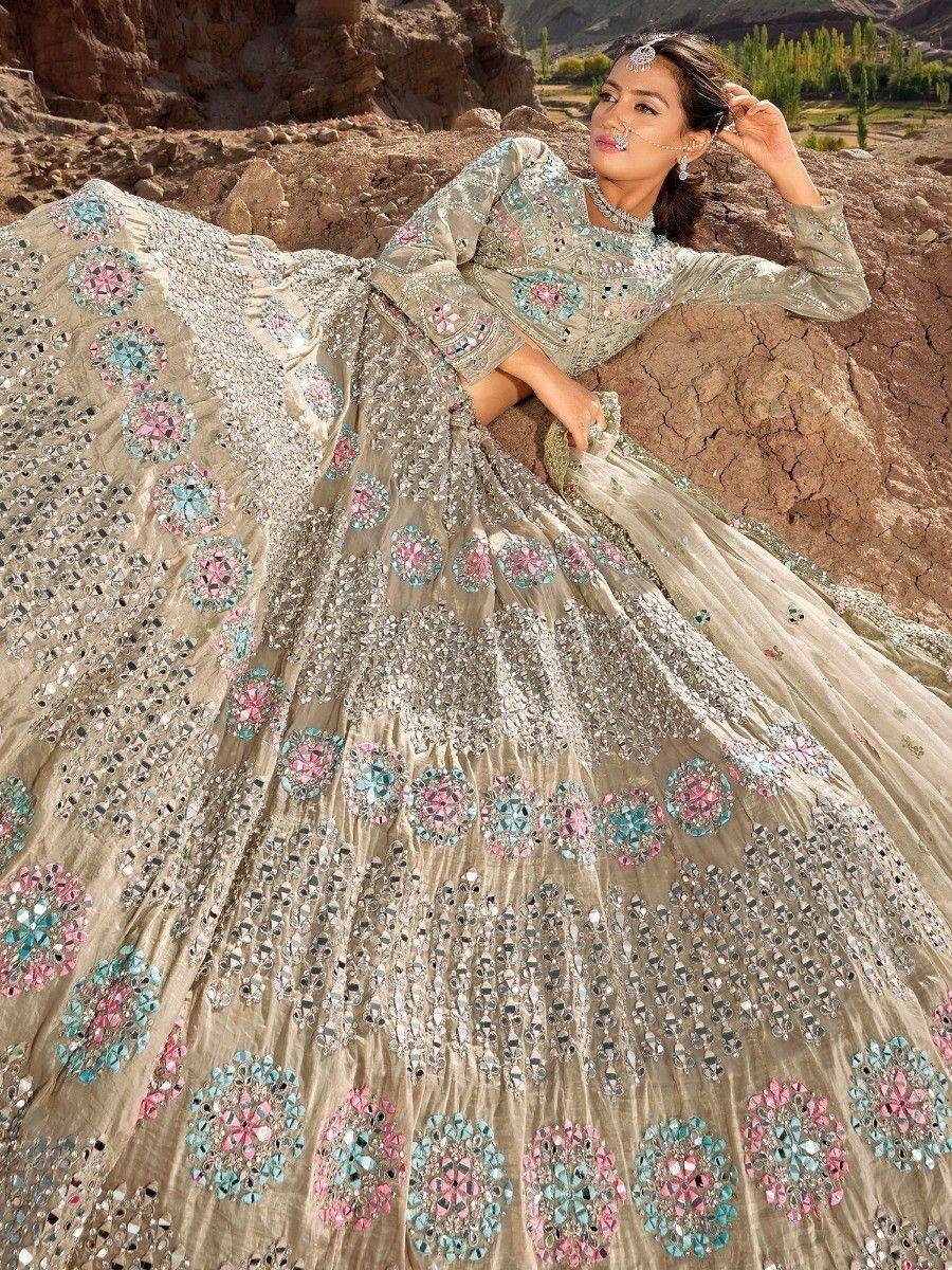 Designer lehenga choli with mirror work and floral embroidery, perfect for Indian ethnic wear