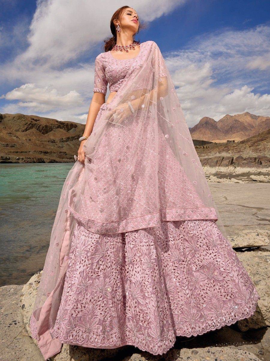 Pink embroidered lehenga choli with sheer dupatta, perfect for Indian weddings and festive occasions
