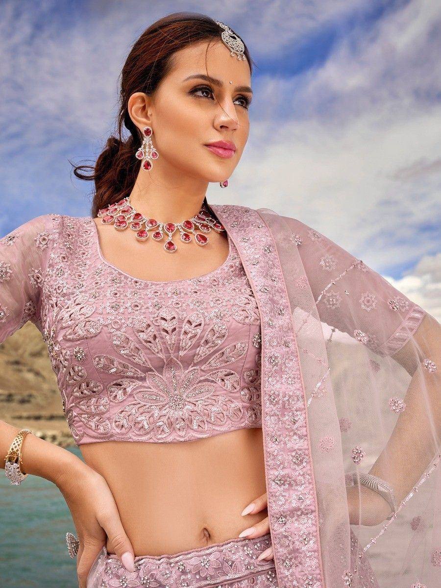 Pink embroidered lehenga choli with matching dupatta, perfect for Indian weddings and festive occasions