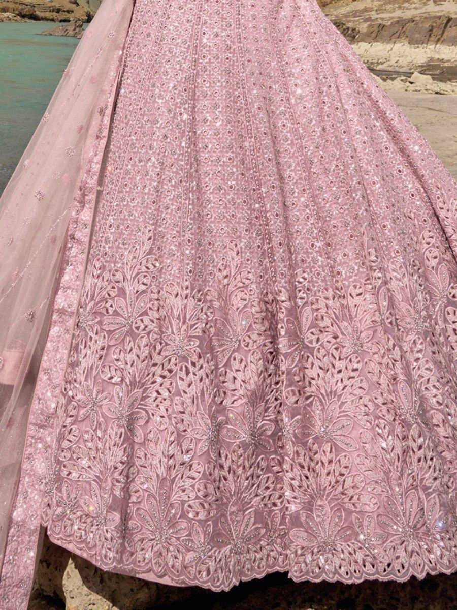 Pink embroidered lehenga with floral motifs, perfect for Indian ethnic wear and festive occasions.