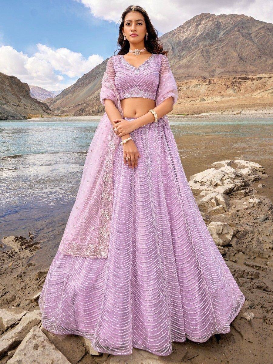 Lavender designer lehenga choli with intricate embroidery, perfect for Indian ethnic wear occasions