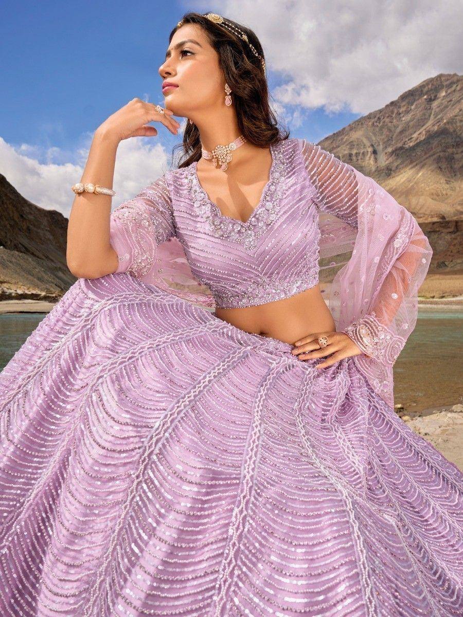 Lavender designer lehenga choli with intricate beadwork, perfect for Indian ethnic wear occasions