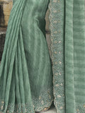 Fascinating Teal Green Jarkan Work Tissue Silk Saree With Blouse