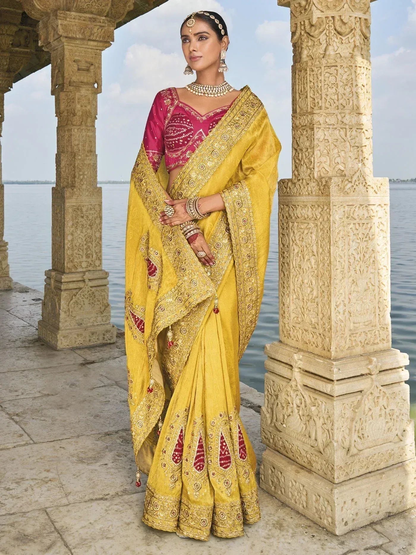 Yellow embroidered saree with pink blouse, traditional Indian ethnic wear, perfect for weddings and festivals