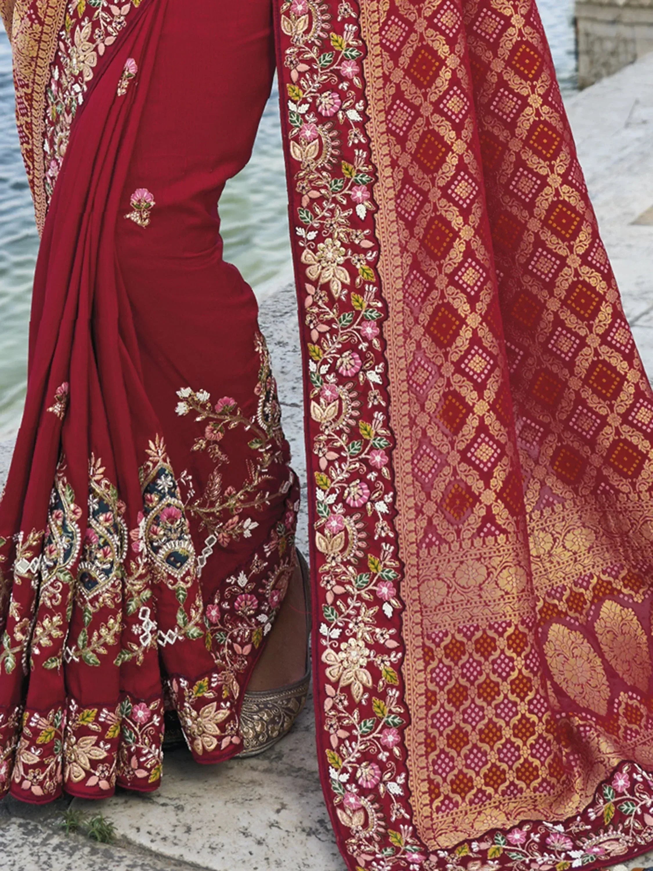 Red embroidered lehenga choli with floral gold detailing, perfect for Indian ethnic wear