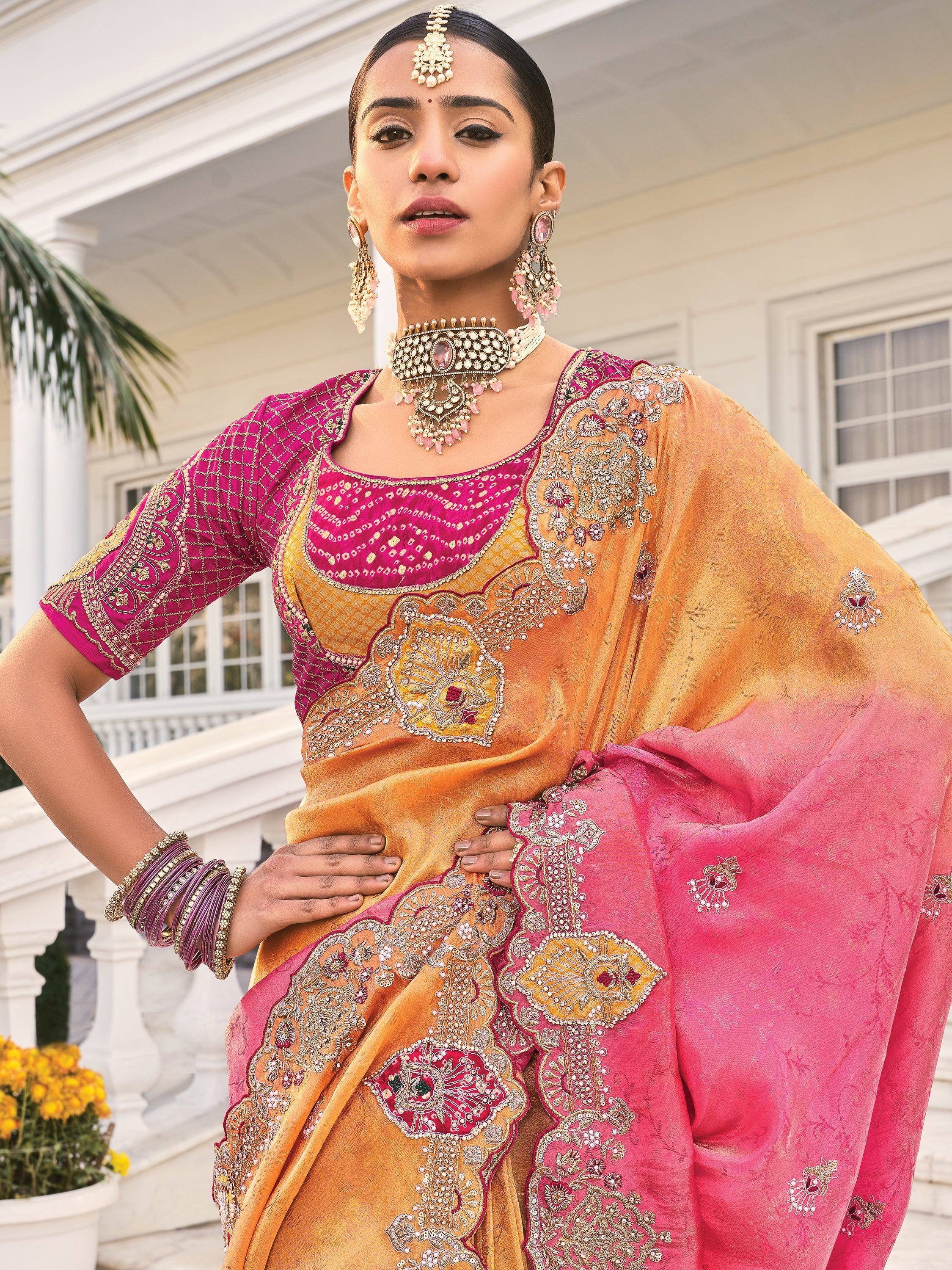 Elegant pink and gold embroidered saree with designer blouse, perfect for Indian ethnic occasions.