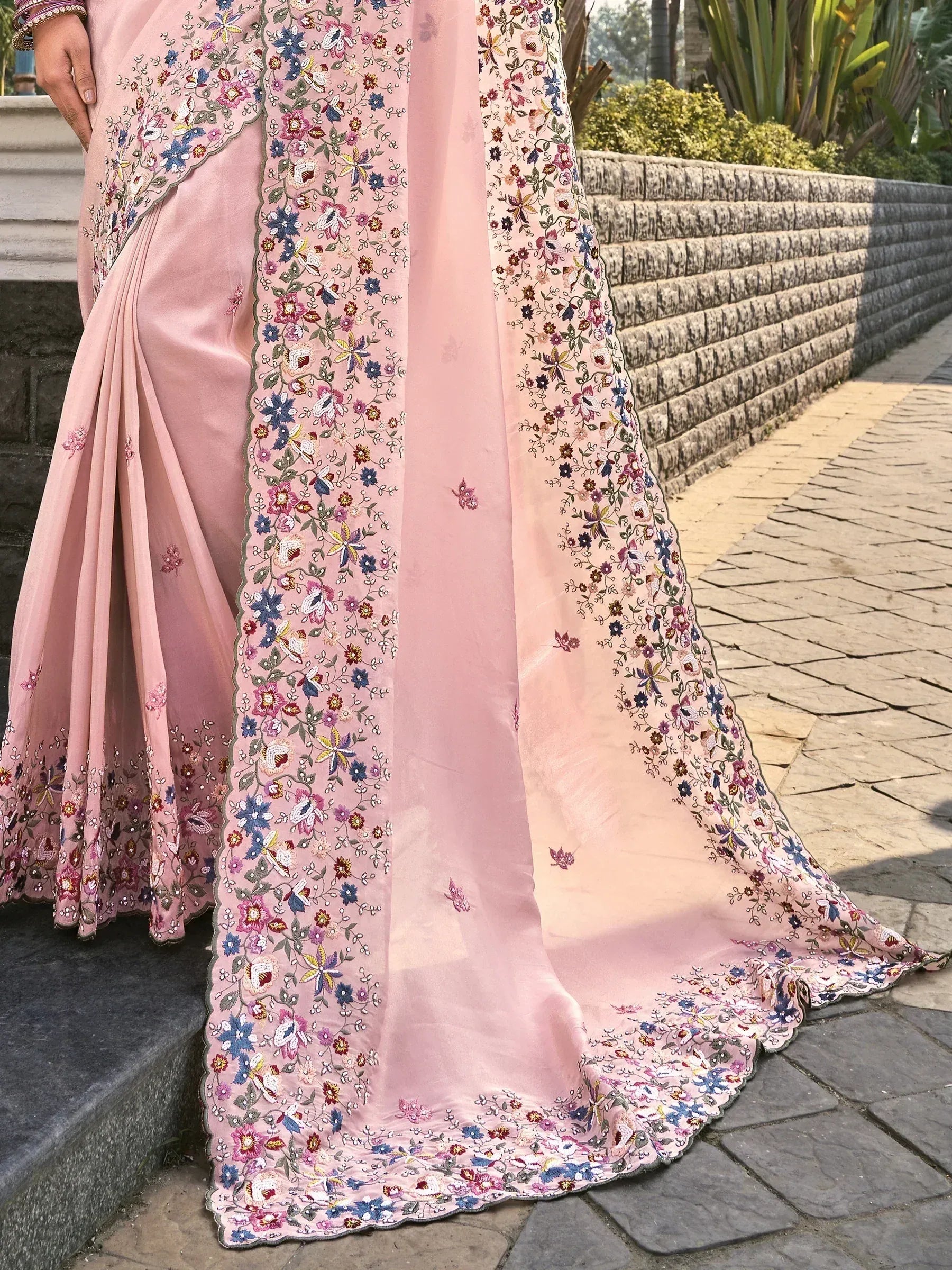Pink floral embroidered saree with intricate detailing, perfect for ethnic occasions