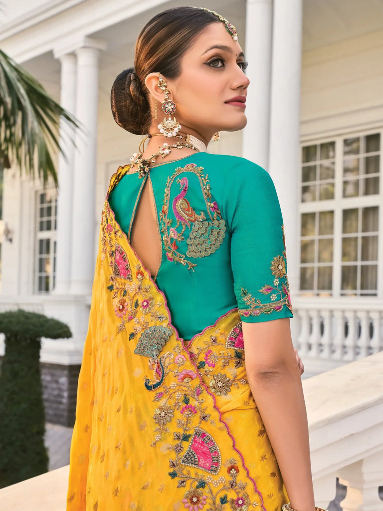 Beautiful Yellow Heavy Border Work Crepe Wedding Saree With Blouse