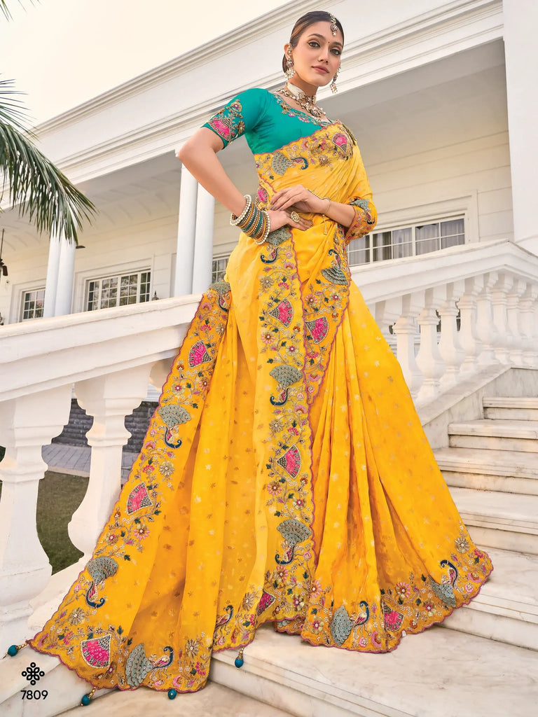 Beautiful Yellow Heavy Border Work Crepe Wedding Saree With Blouse