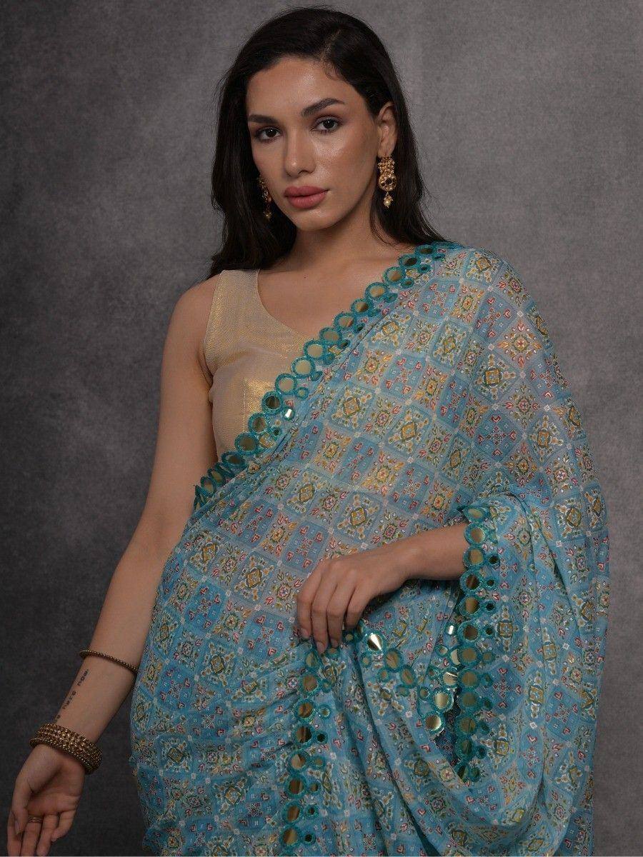 Blue printed saree with mirror work and gold blouse, ethnic Indian wear for women