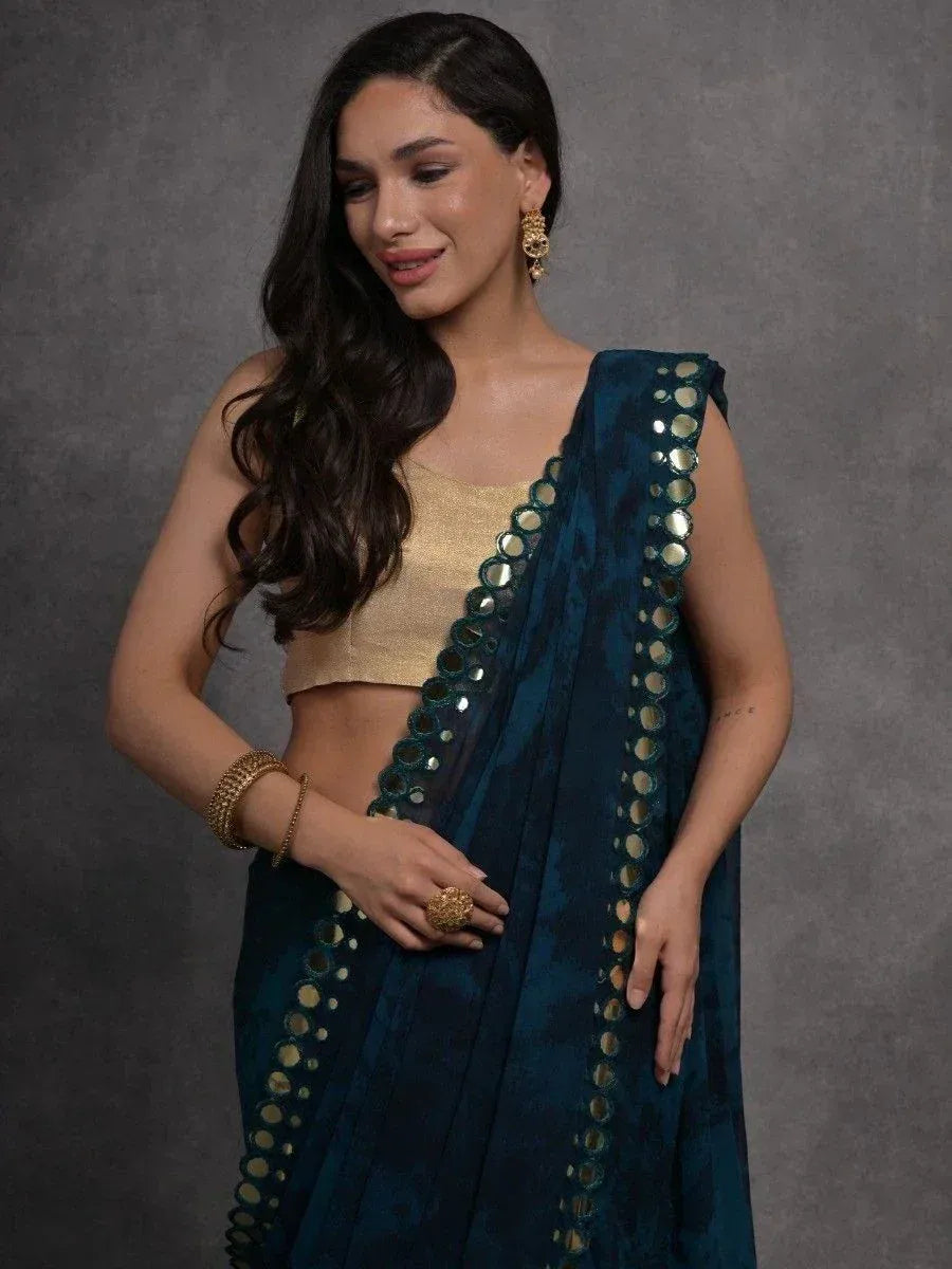 Teal mirror-work saree with gold blouse, ethnic Indian wear for women
