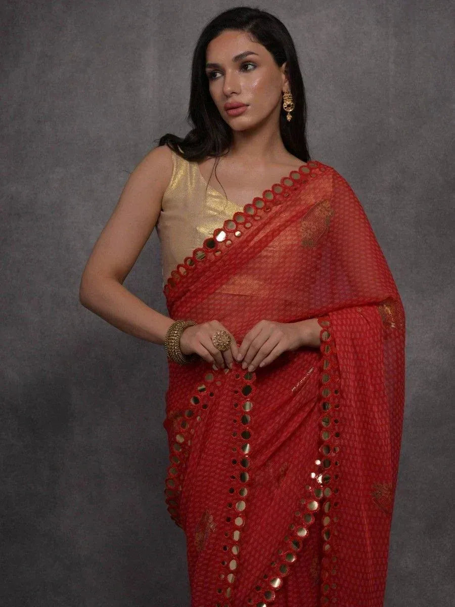 Red saree with mirror work and gold blouse, ethnic Indian wear