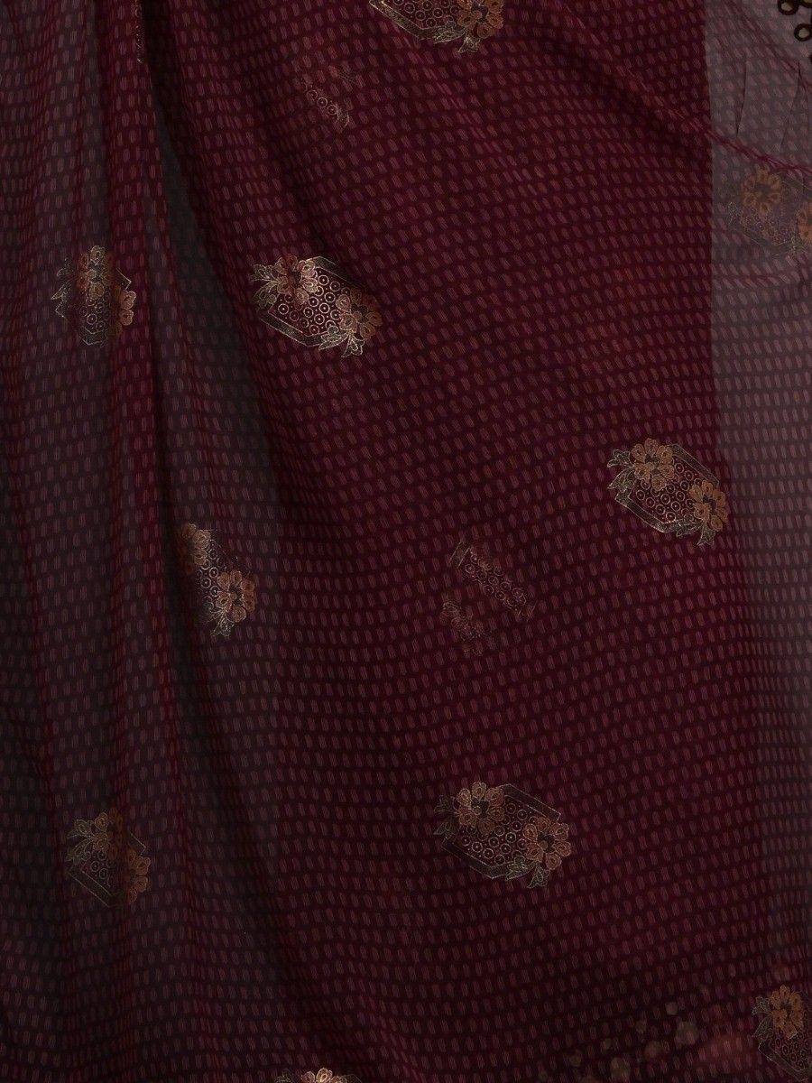 Maroon ethnic saree with gold floral motifs and textured weave pattern