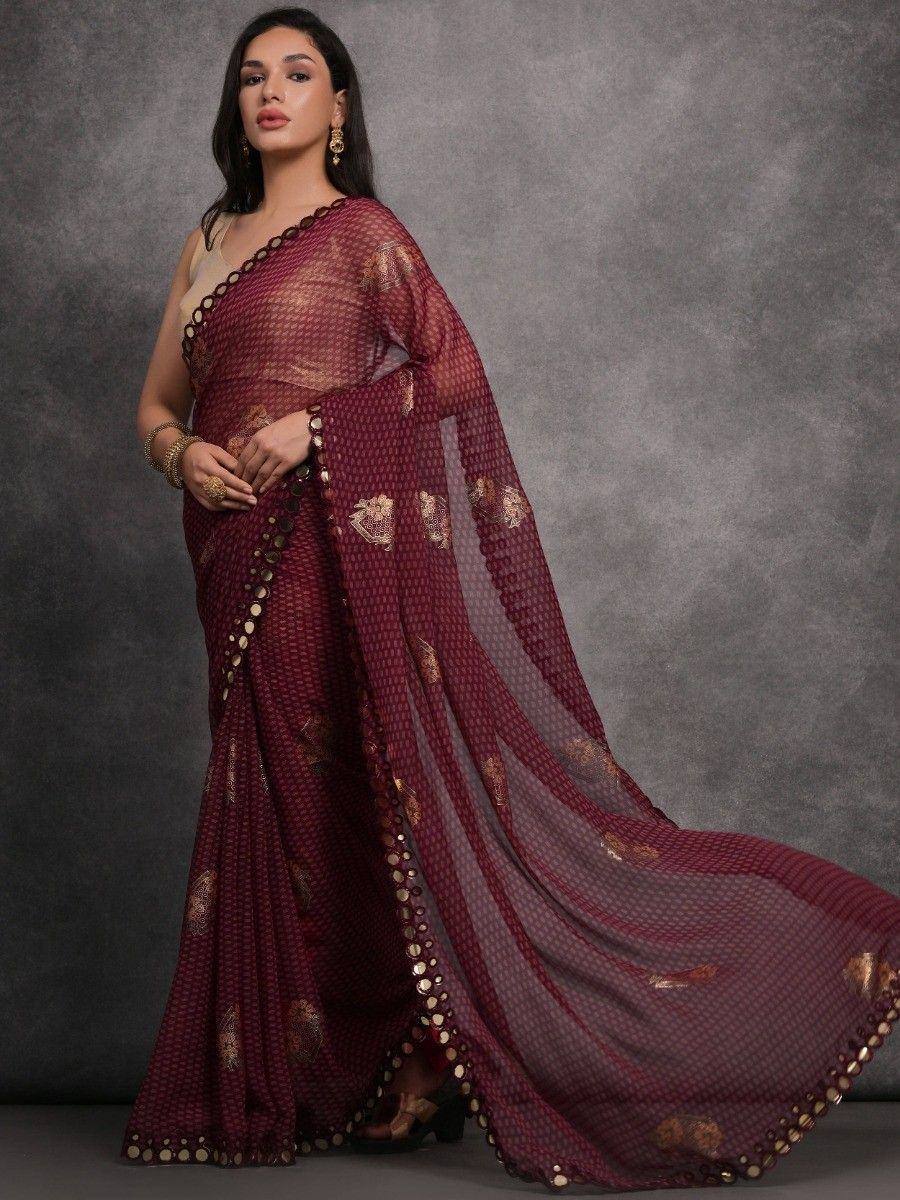 Elegant maroon saree with gold embroidery and sequin border, perfect for Indian ethnic wear
